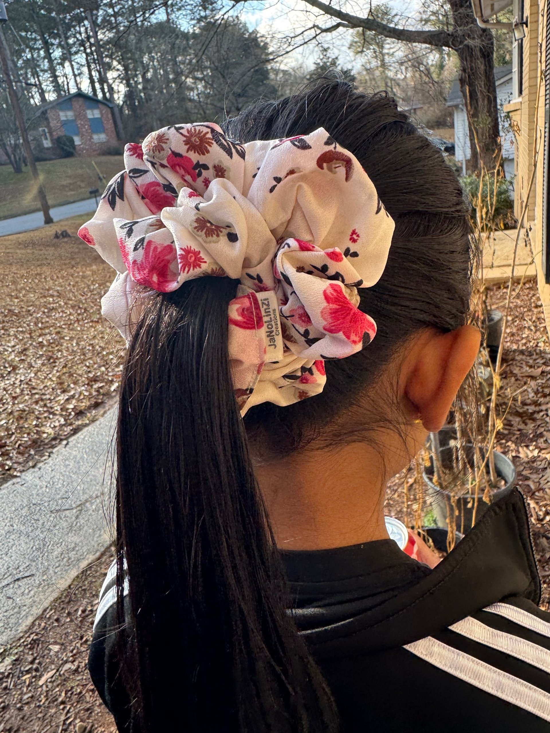 person wearing grey knit sweater