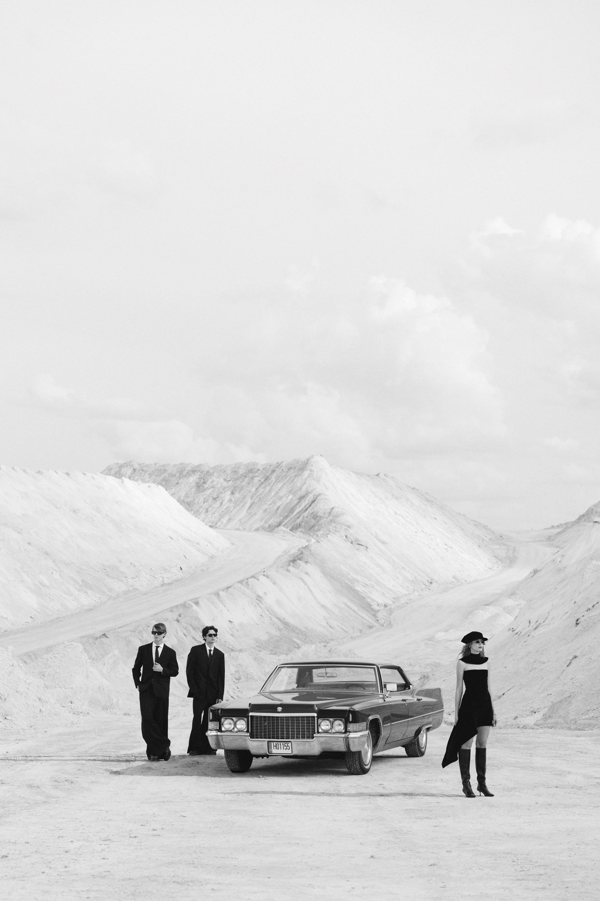 black clothes hanged in rack