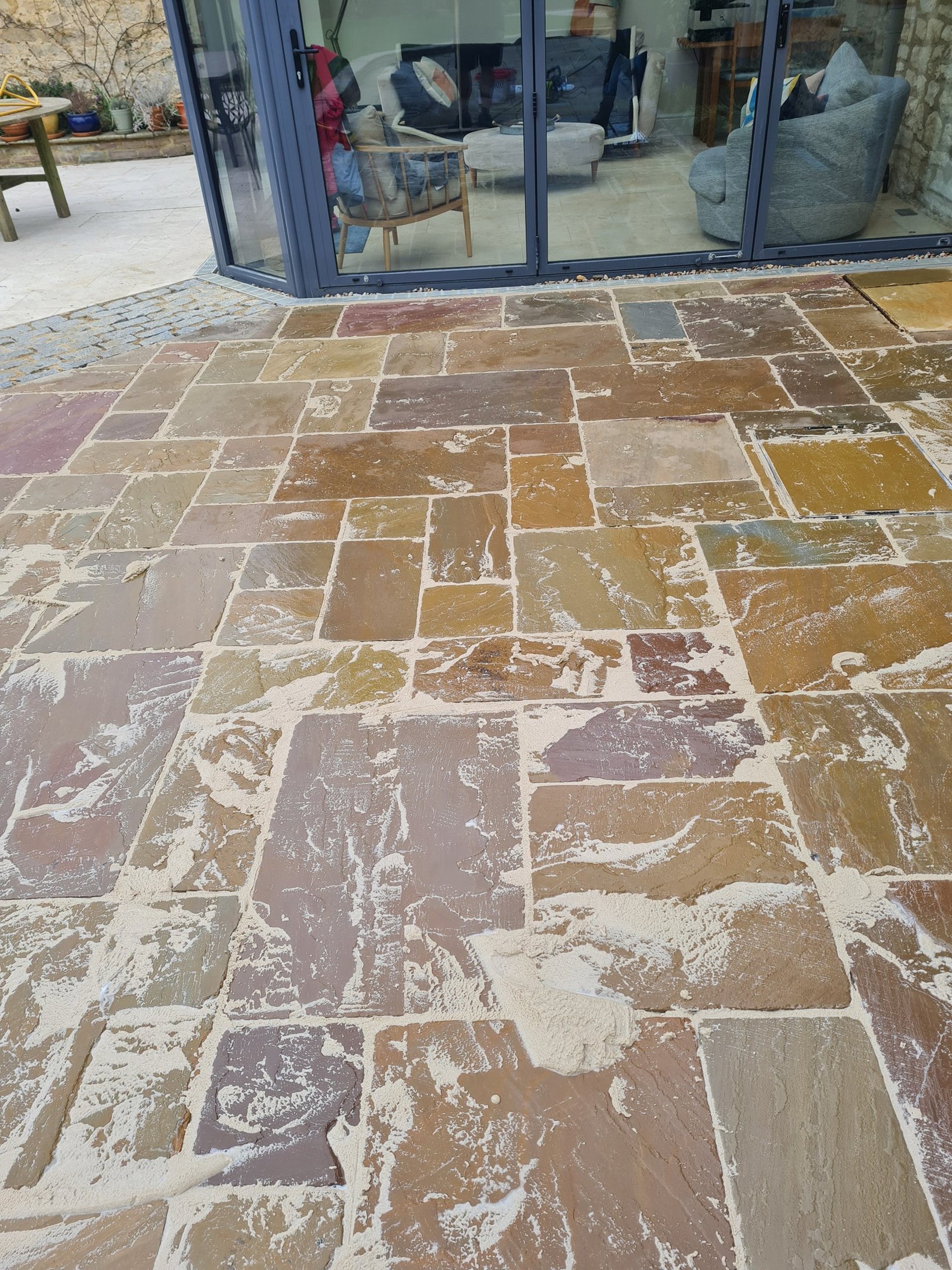 an abstract photo of a curved building with a blue sky in the background