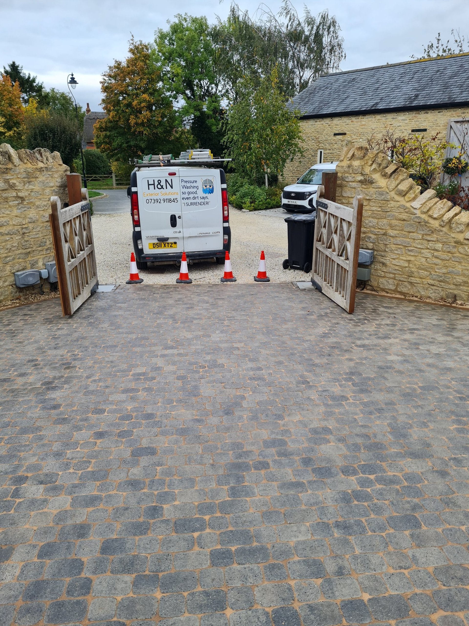 an abstract photo of a curved building with a blue sky in the background