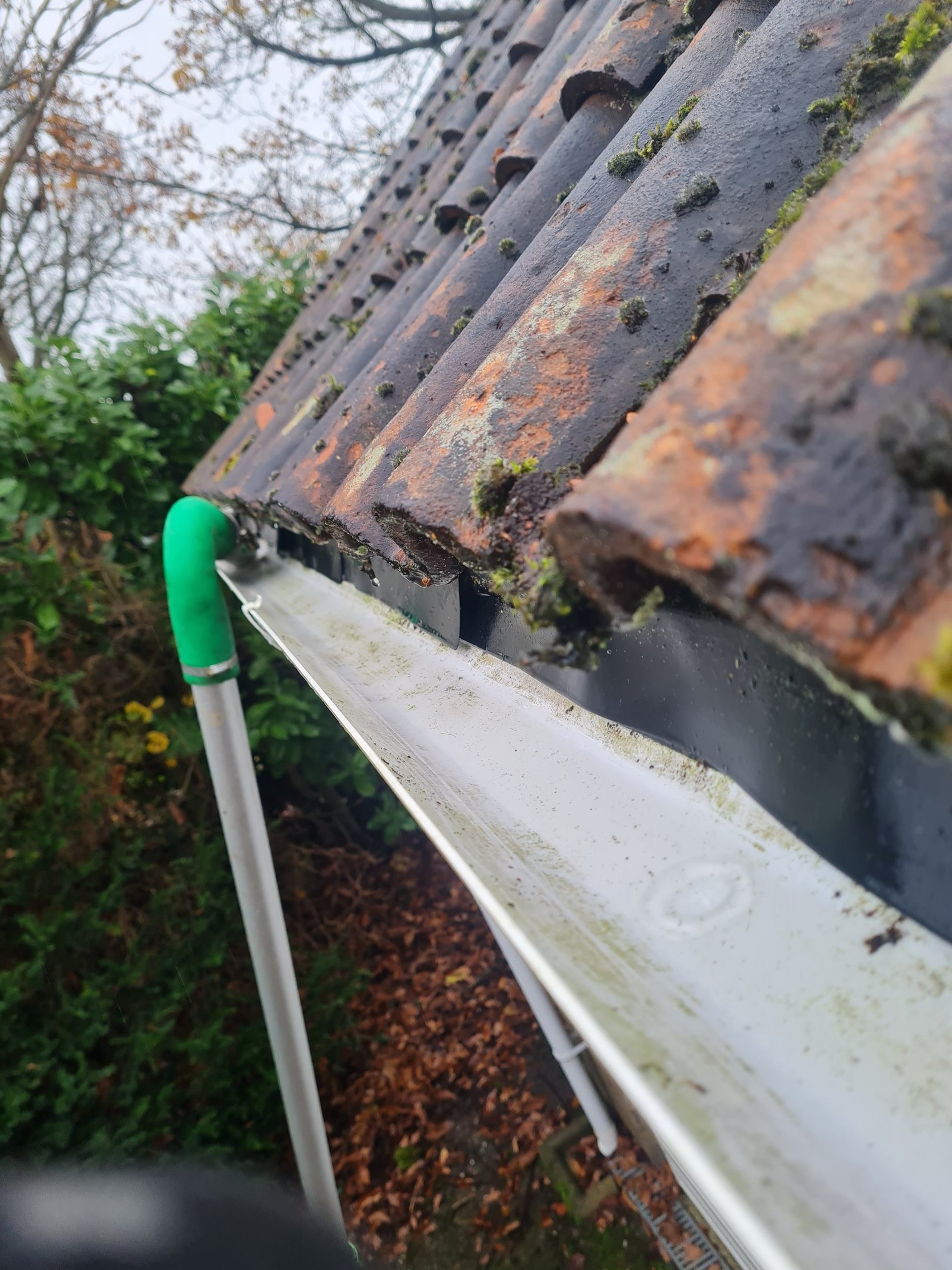 an abstract photo of a curved building with a blue sky in the background