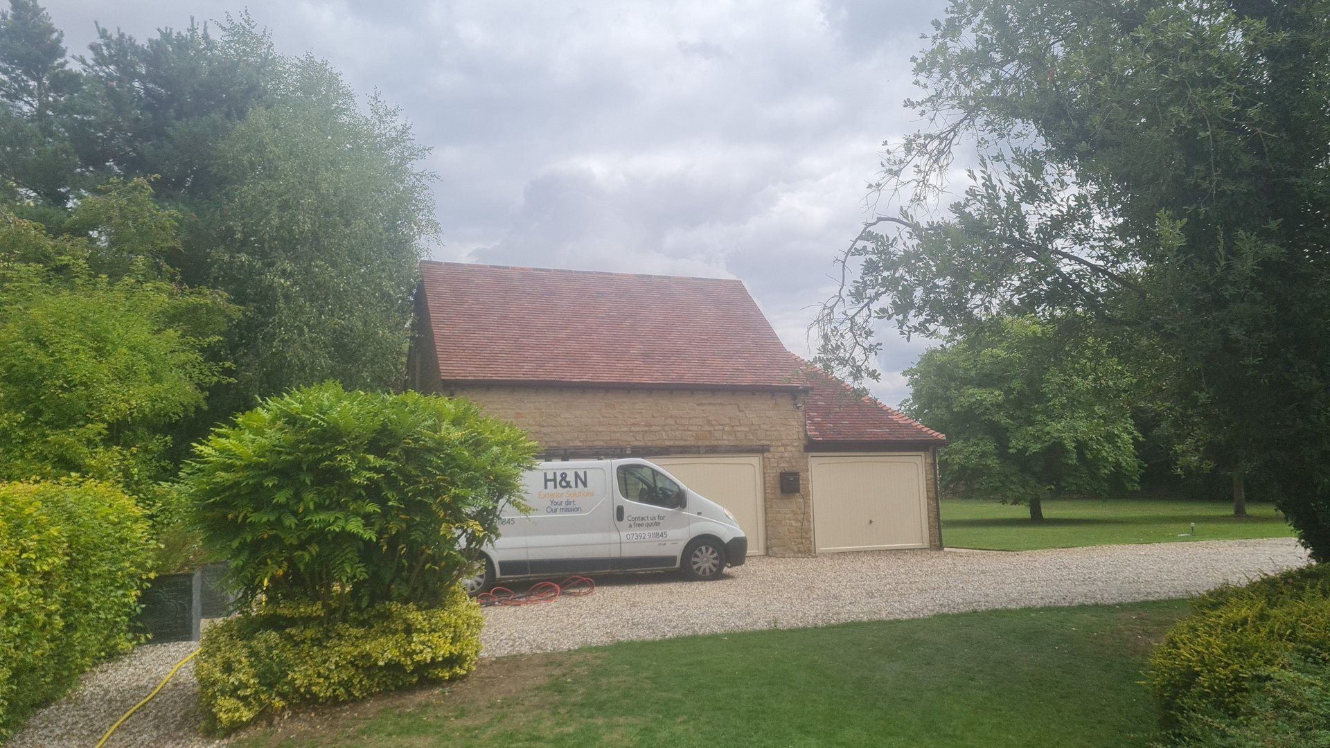 an abstract photo of a curved building with a blue sky in the background