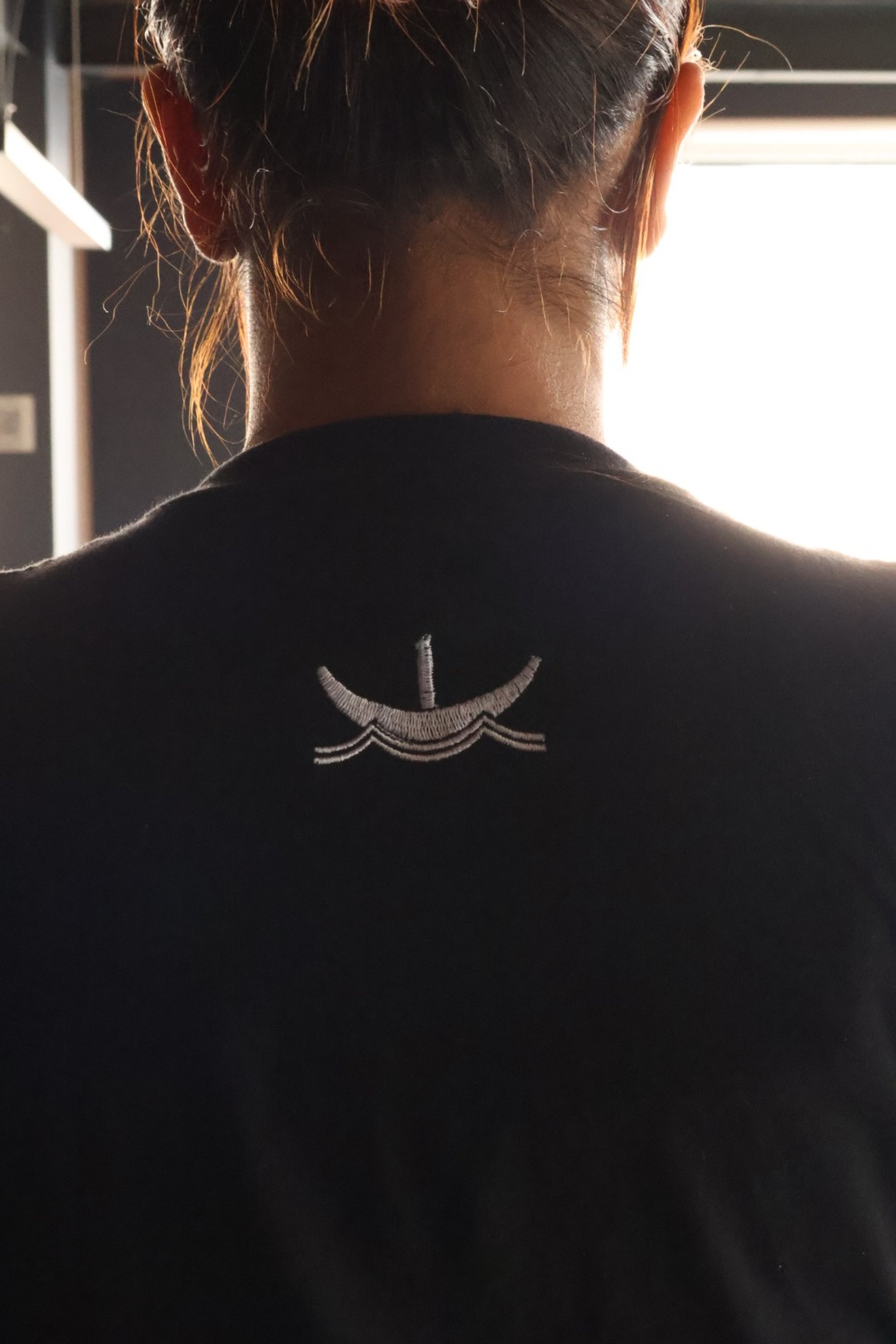 woman wearing yellow long-sleeved dress under white clouds and blue sky during daytime