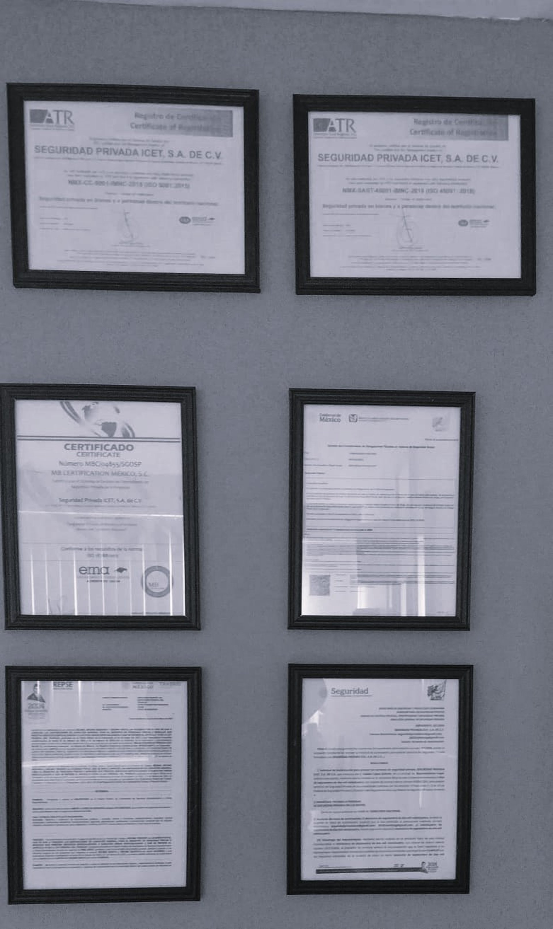 several silver and gold trophies on wooden surface