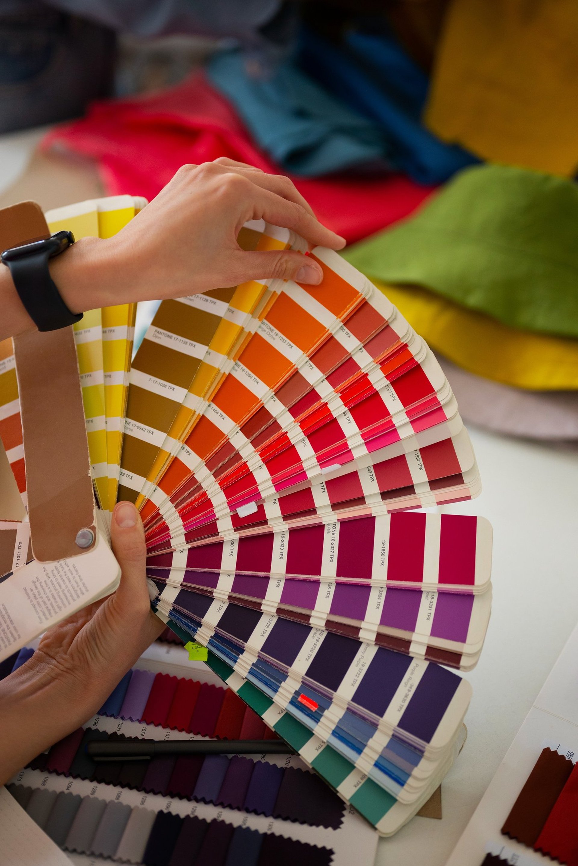 an abstract photo of a curved building with a blue sky in the background