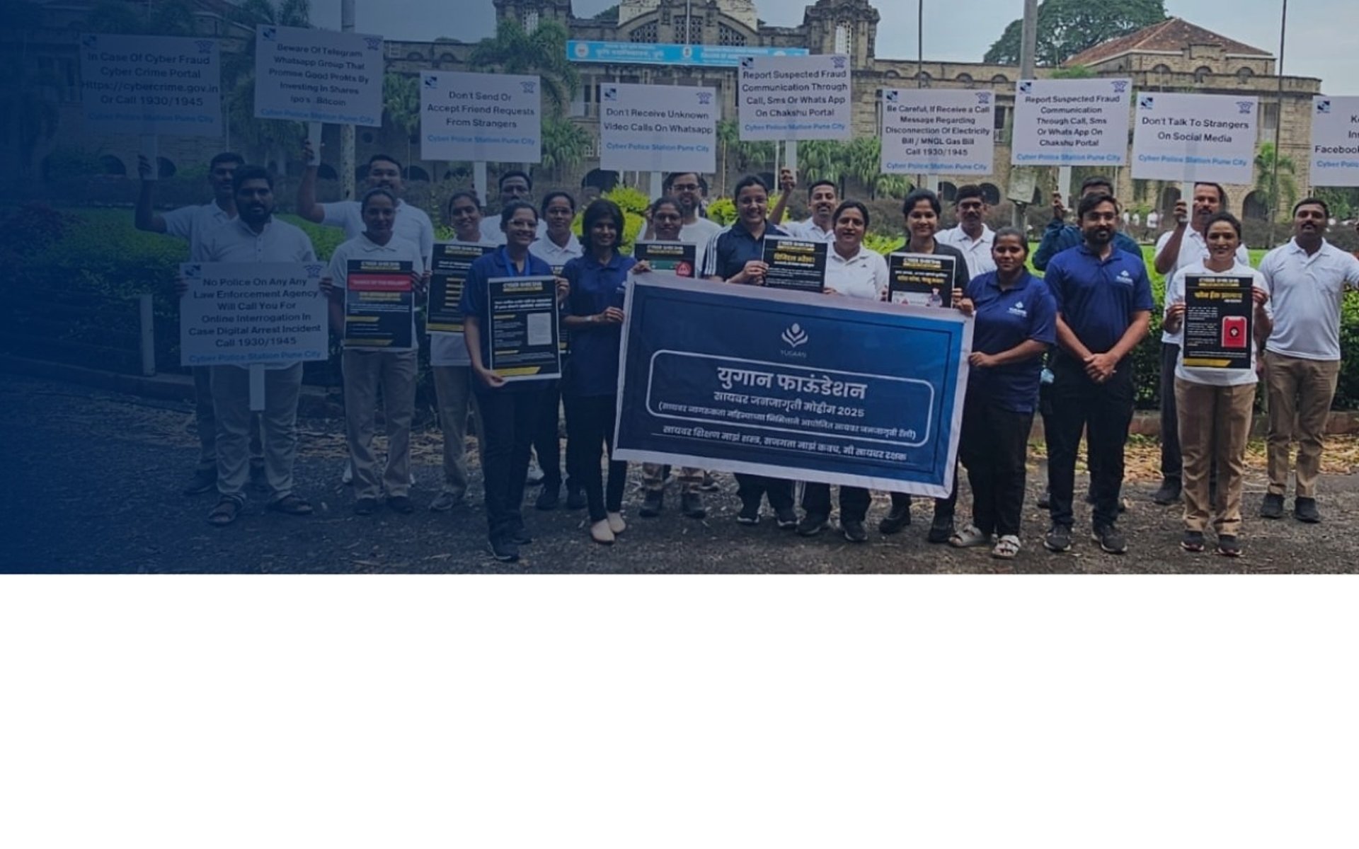 five children smiling while doing peace hand sign