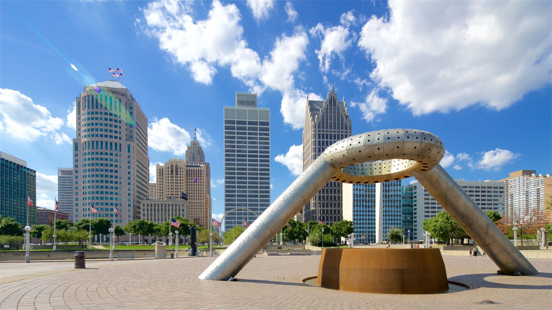 an abstract photo of a curved building with a blue sky in the background