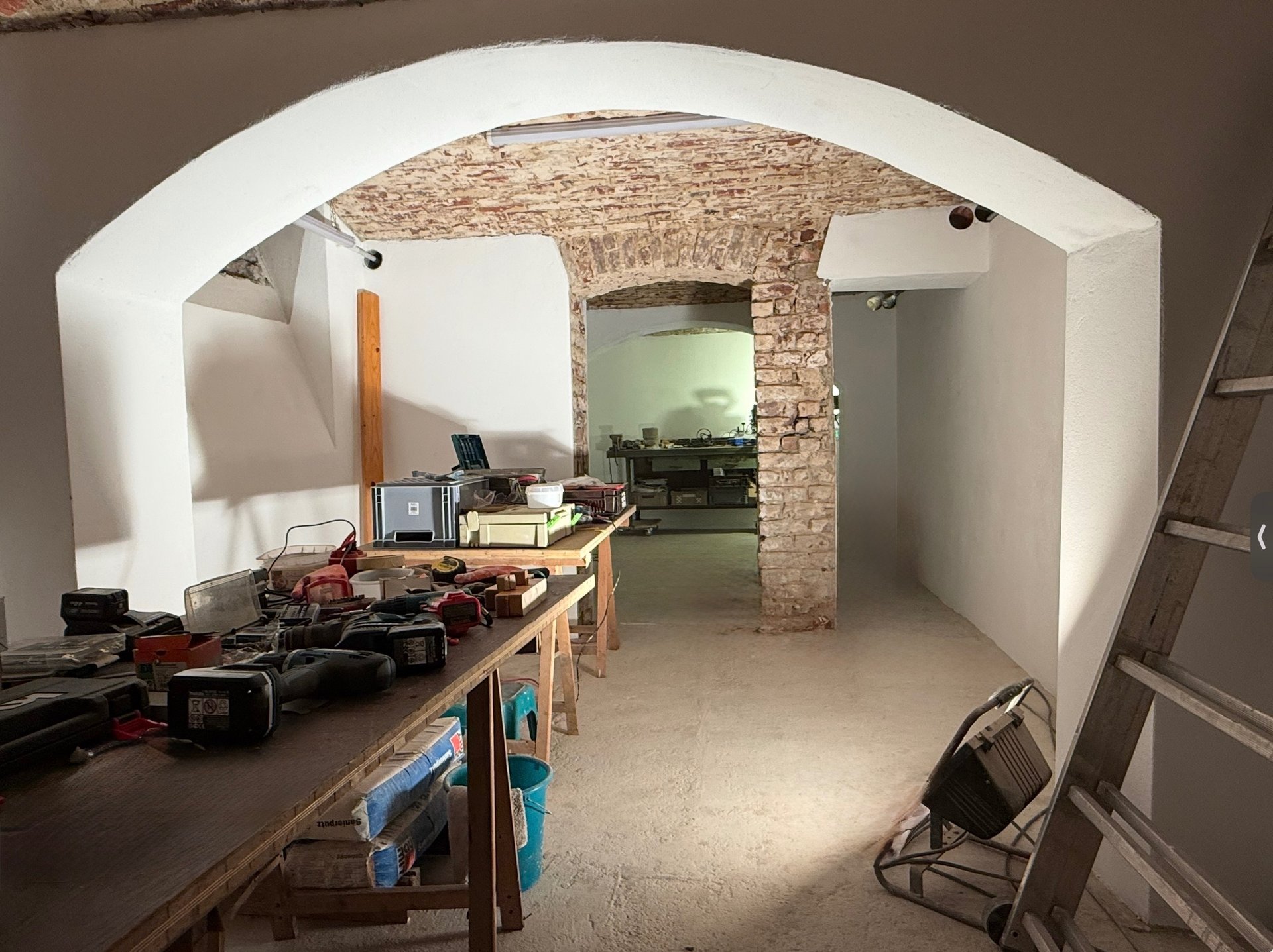 black and brown leather padded tub sofa