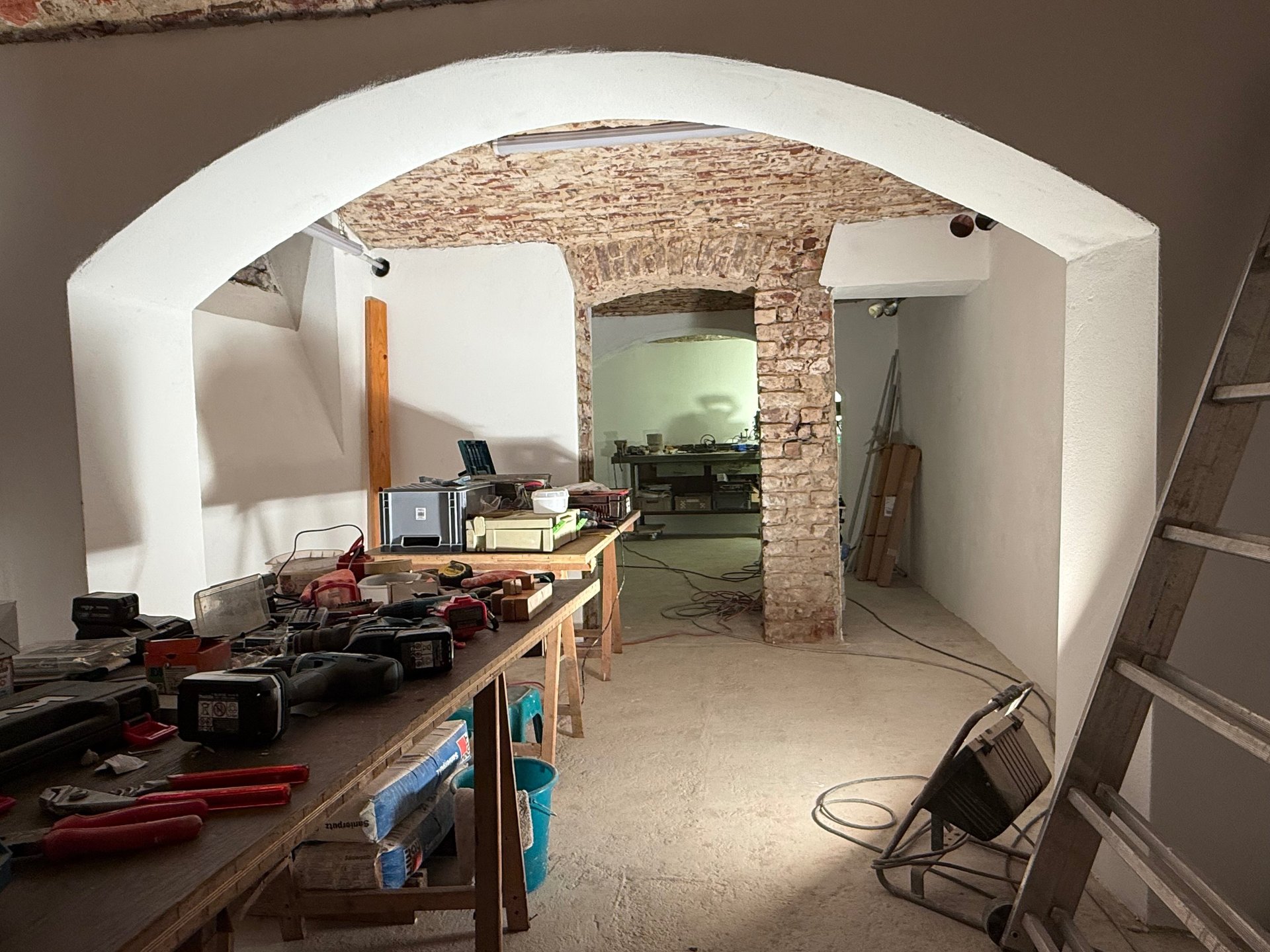 black and brown leather padded tub sofa