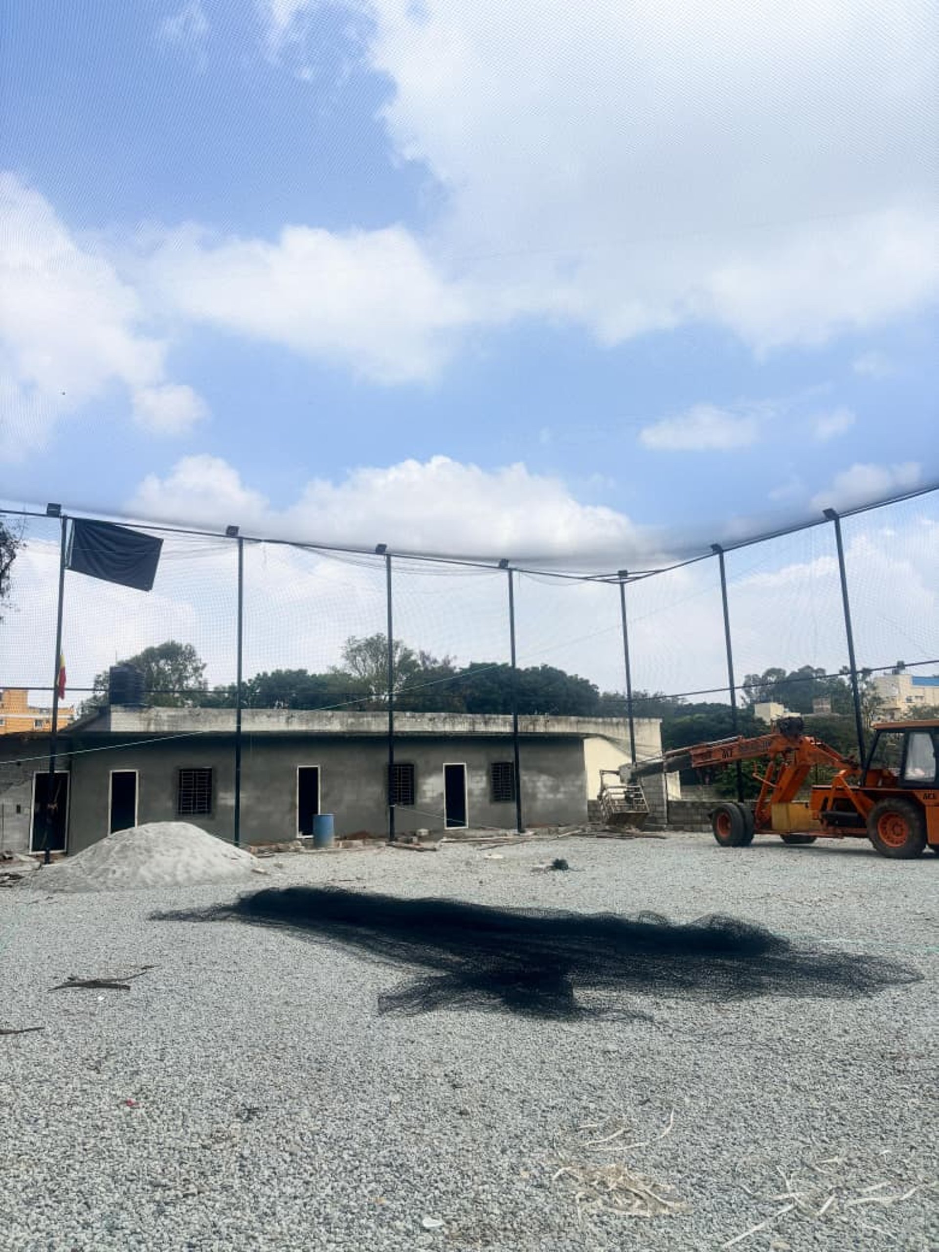 woman wearing yellow long-sleeved dress under white clouds and blue sky during daytime