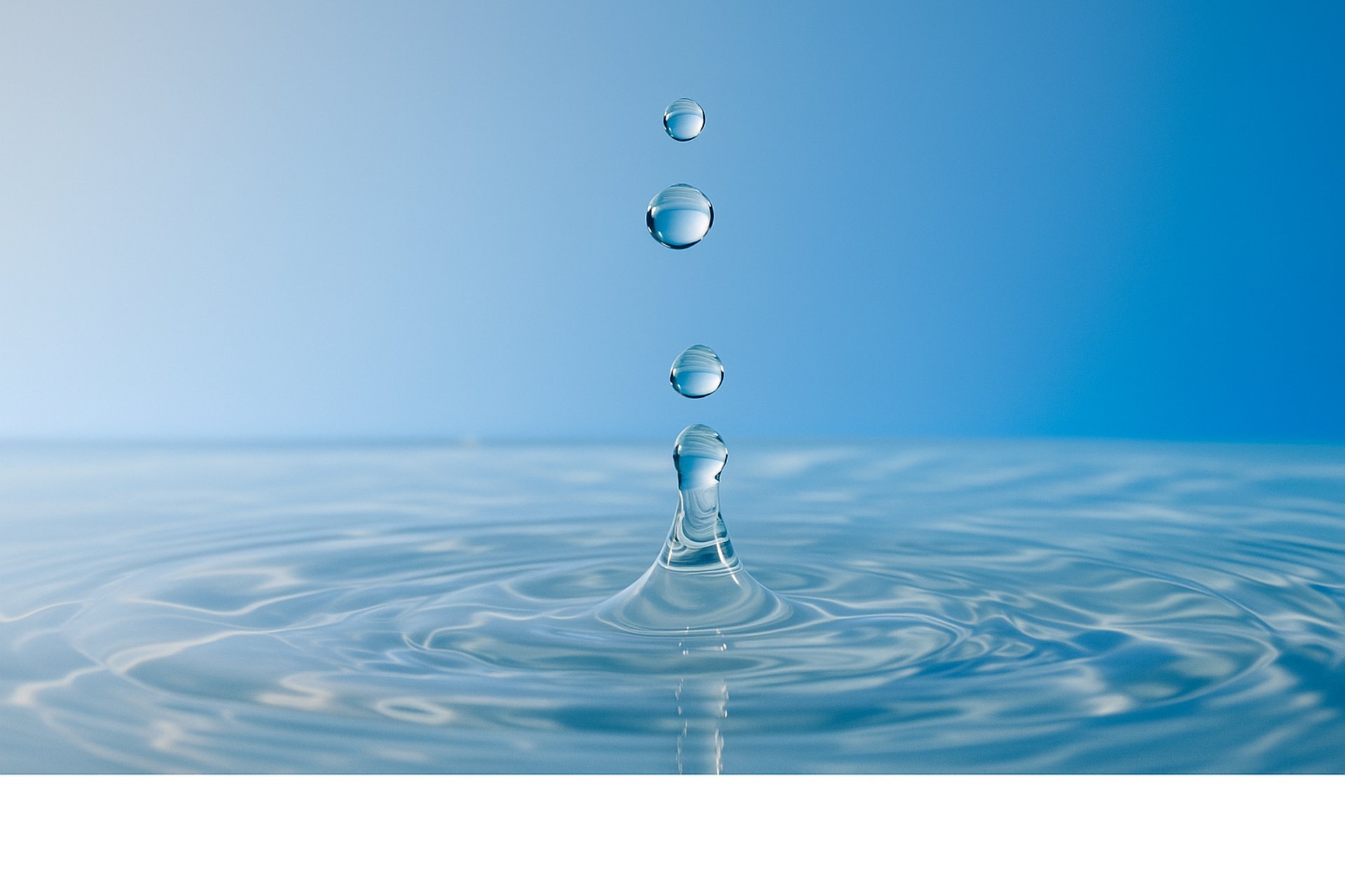 body of water with drops