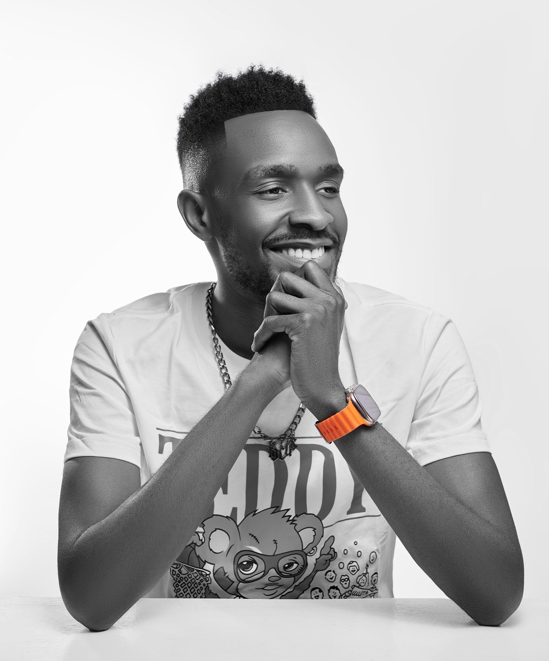 an abstract photo of a curved building with a blue sky in the background