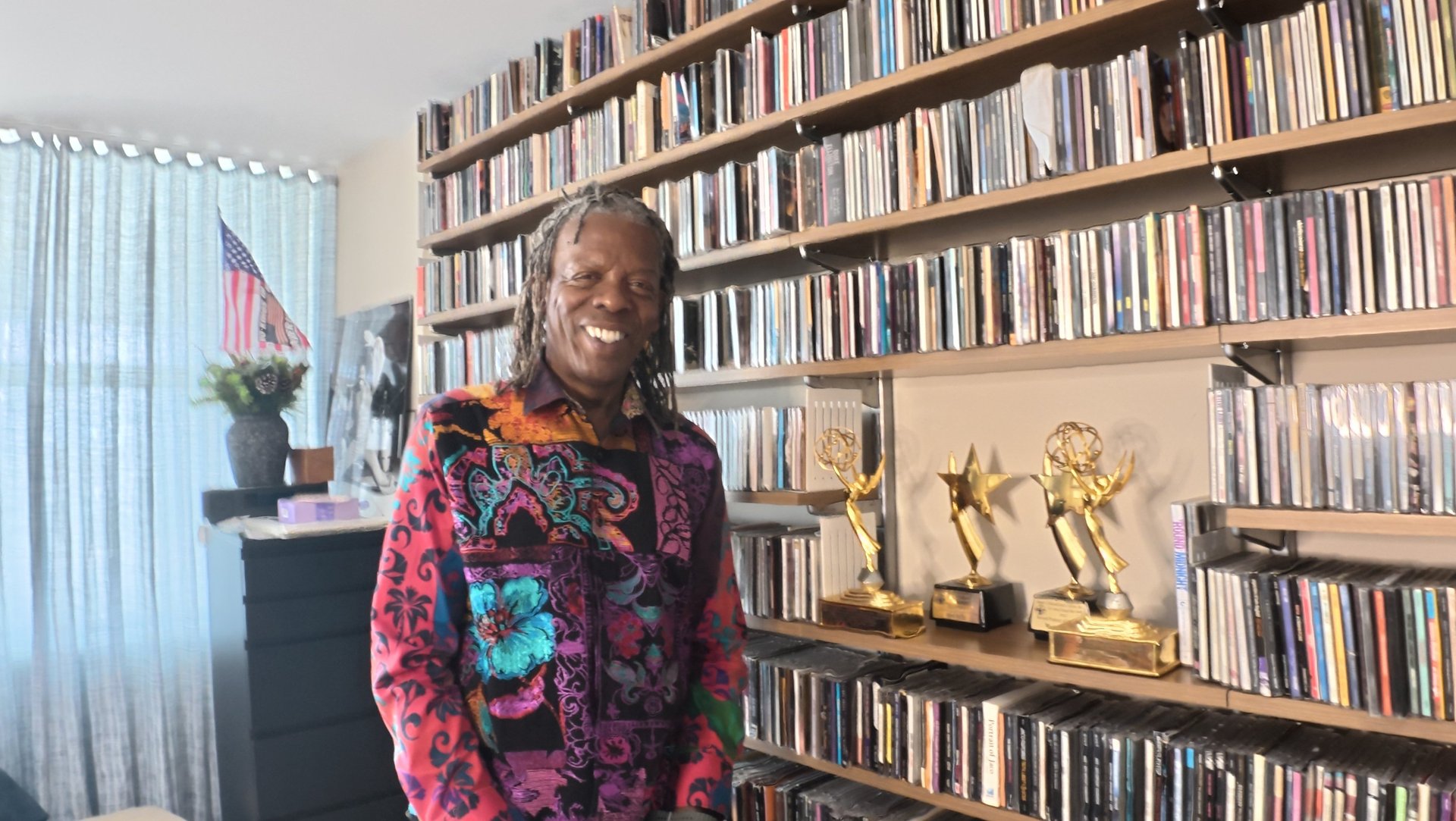 woman wearing yellow long-sleeved dress under white clouds and blue sky during daytime