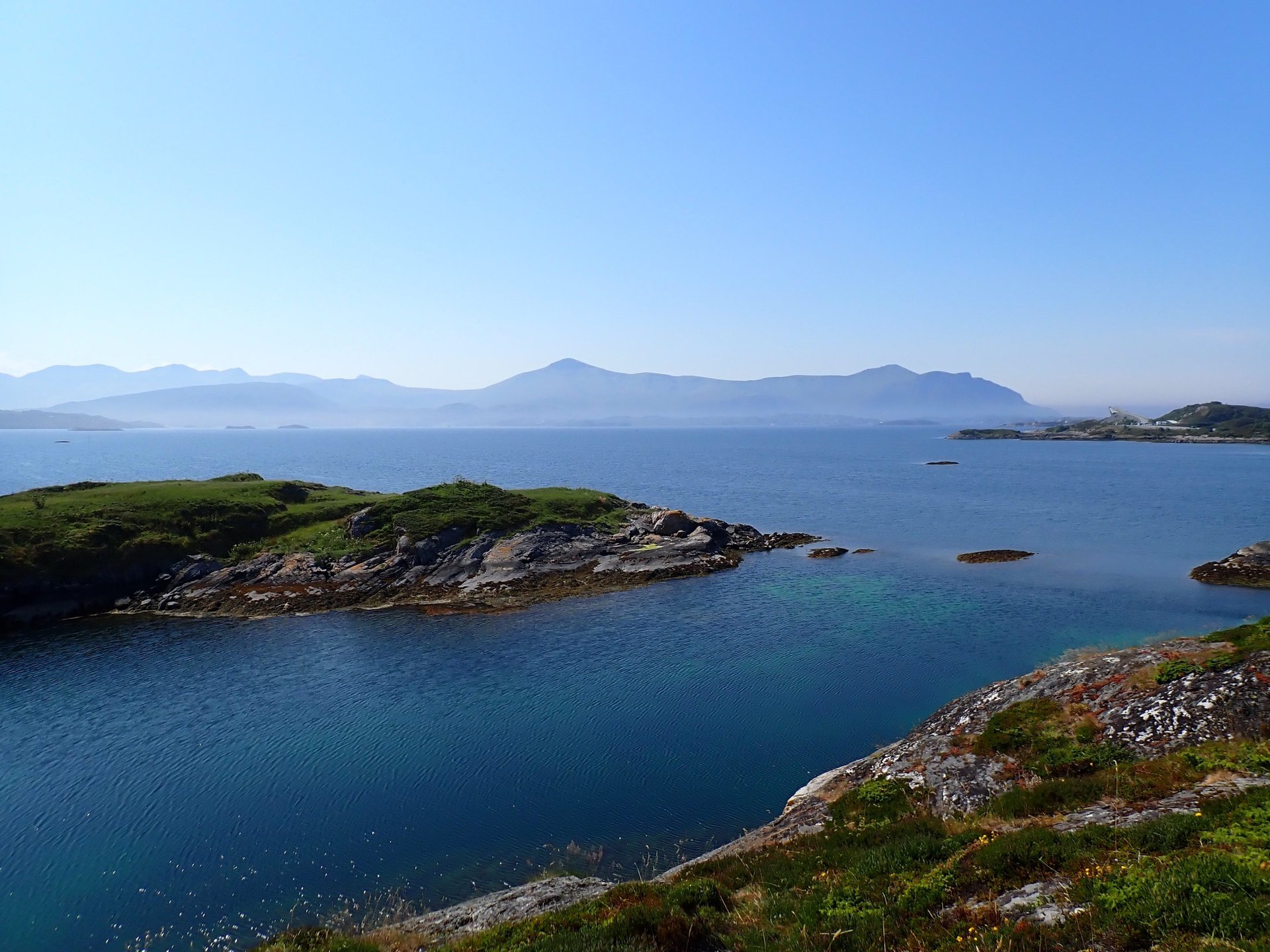 person wearing grey knit sweater