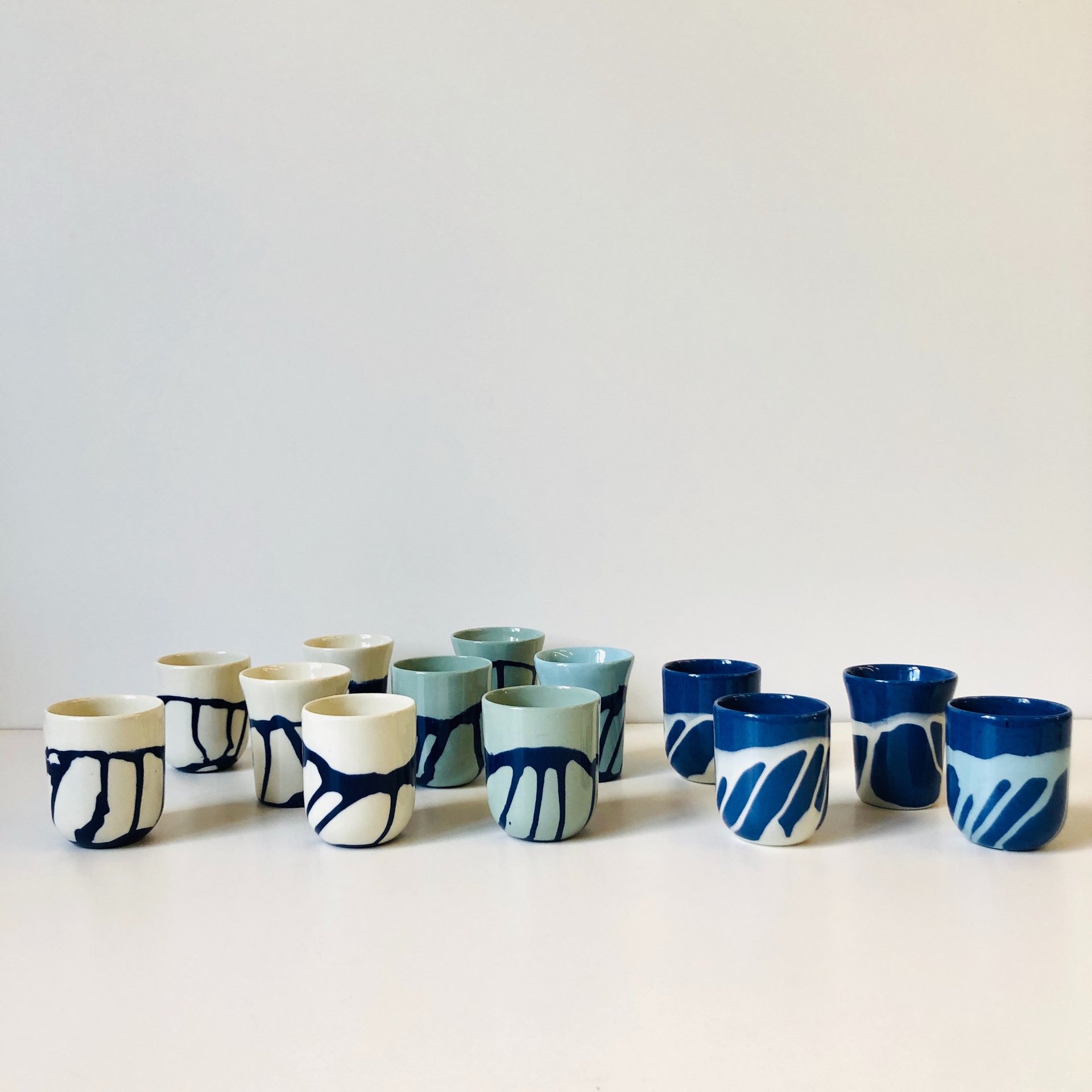 woman wearing yellow long-sleeved dress under white clouds and blue sky during daytime