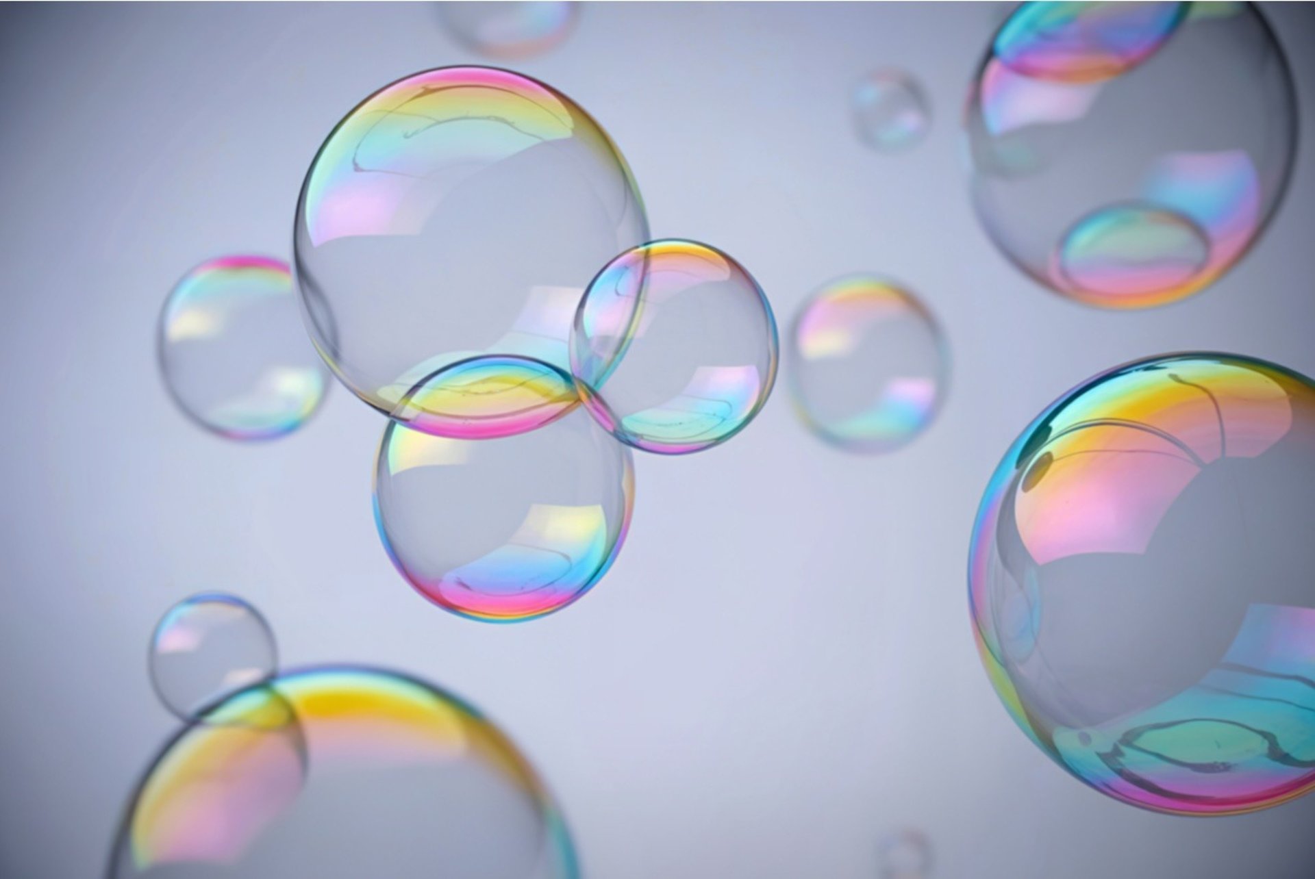 an abstract photo of a curved building with a blue sky in the background