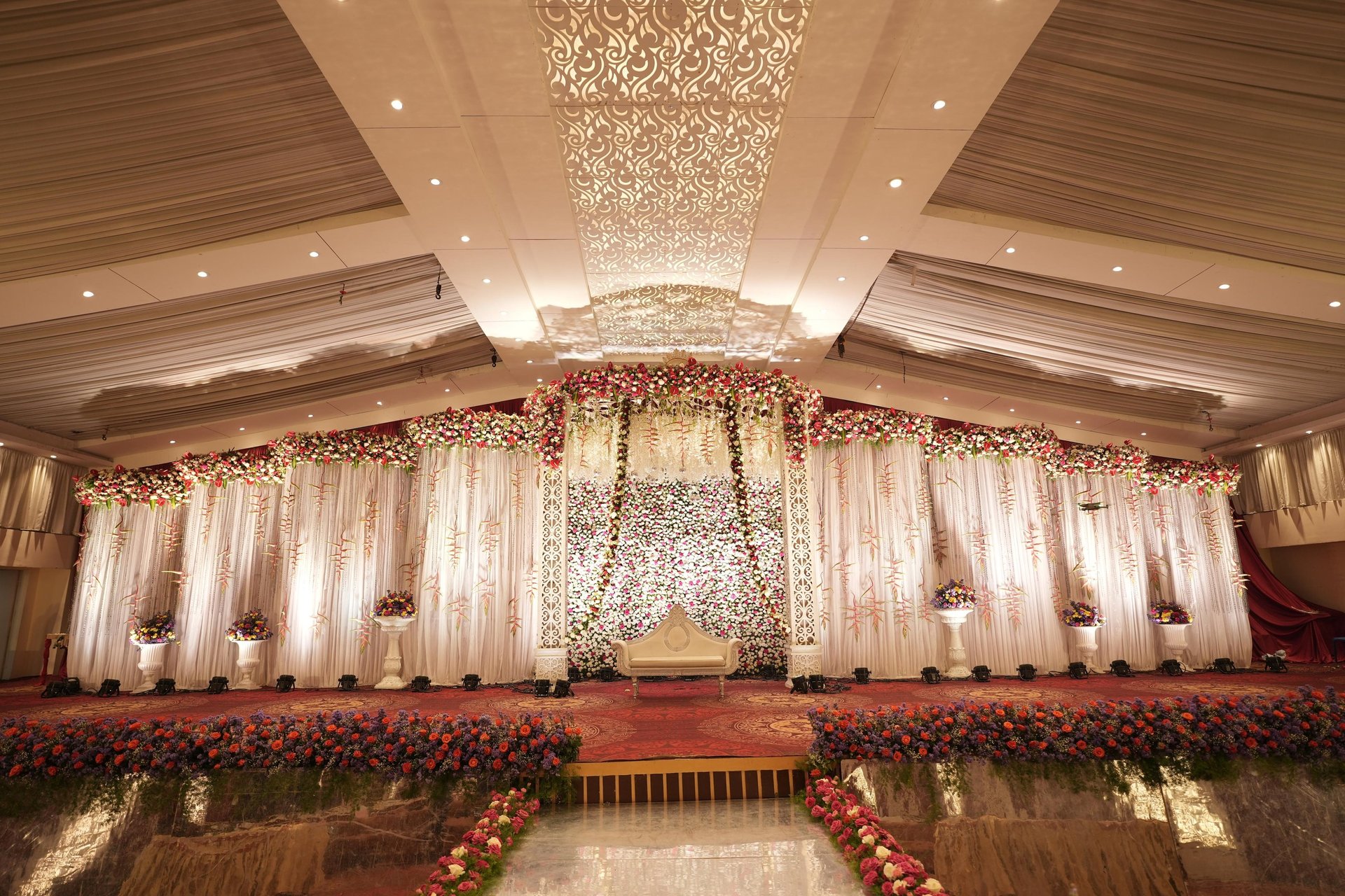 an abstract photo of a curved building with a blue sky in the background