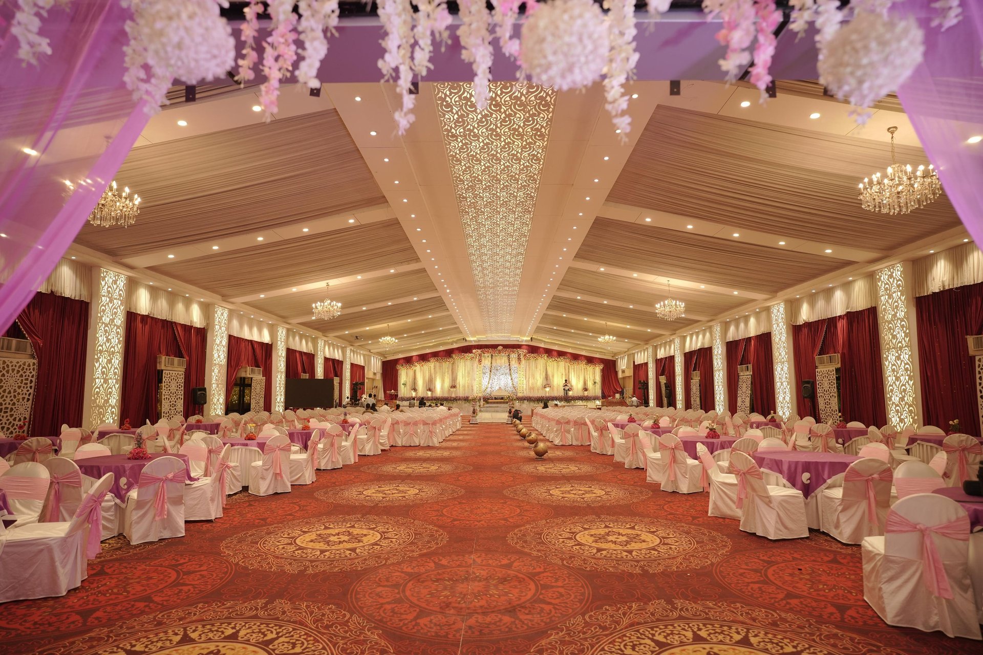 woman wearing yellow long-sleeved dress under white clouds and blue sky during daytime