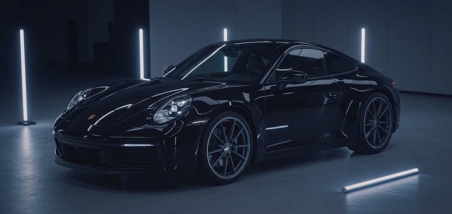 black porsche 911 on road during daytime