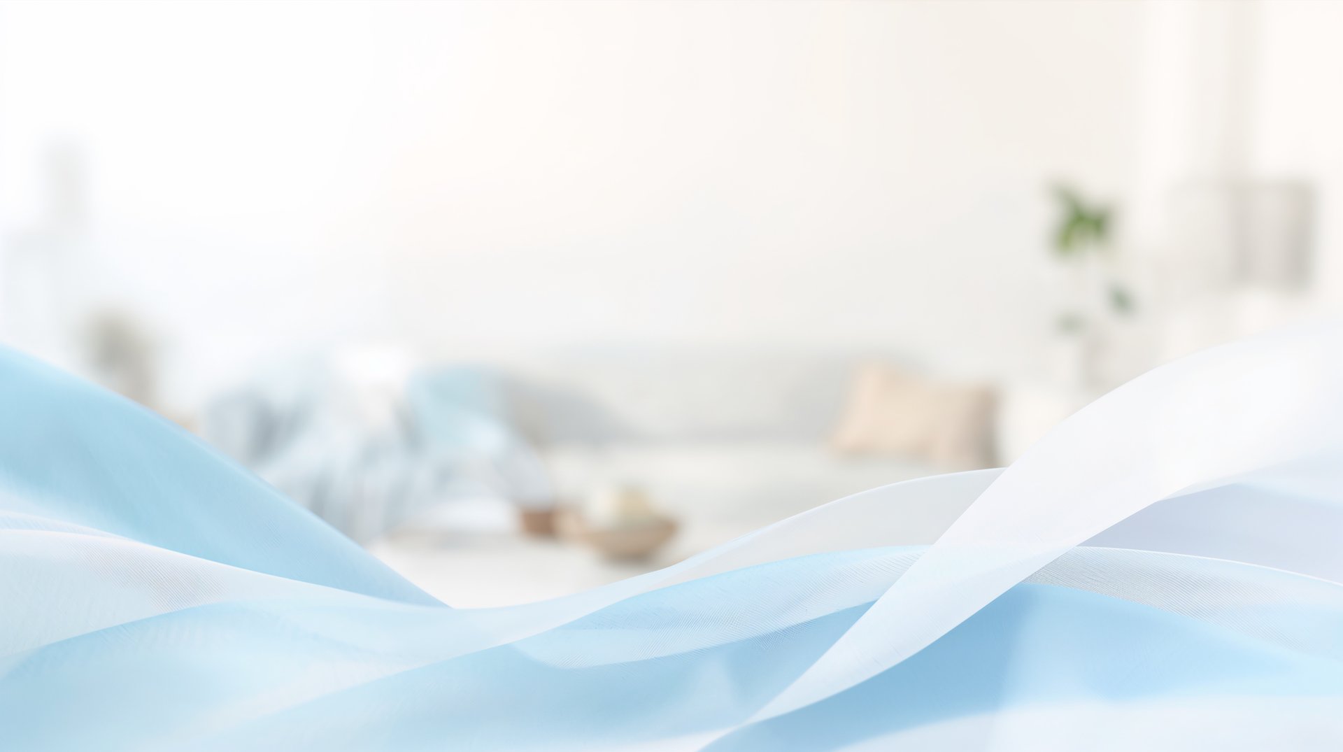 an abstract photo of a curved building with a blue sky in the background