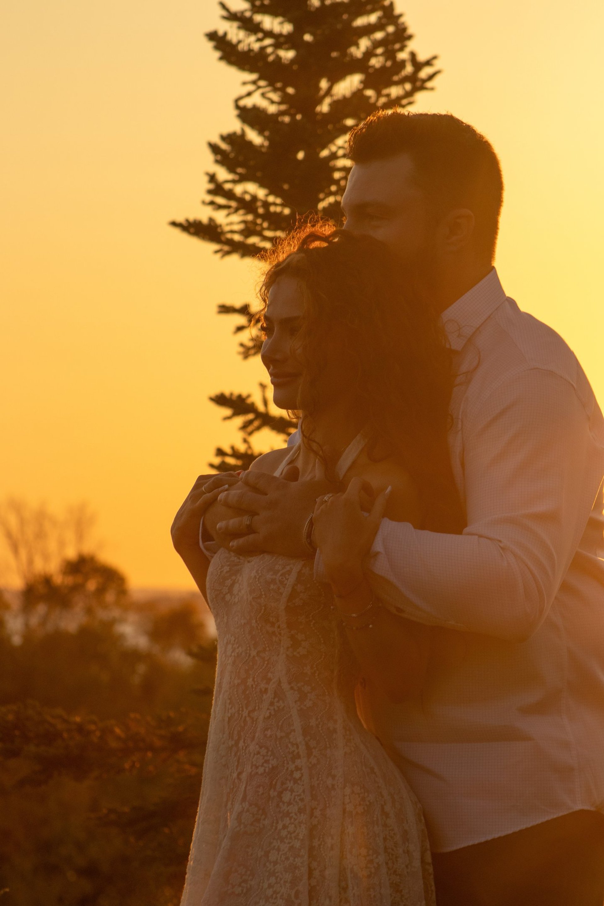couple wearing silver-colored rings