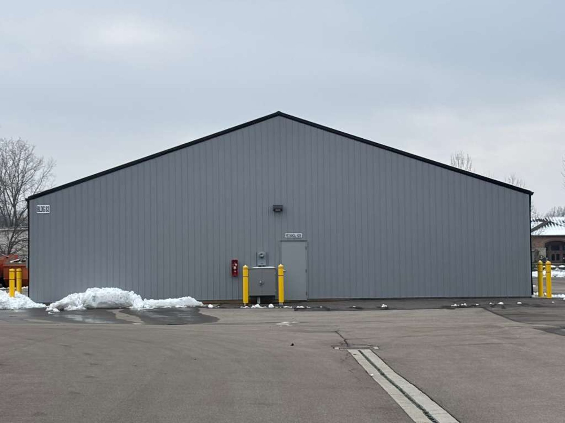 black and brown leather padded tub sofa