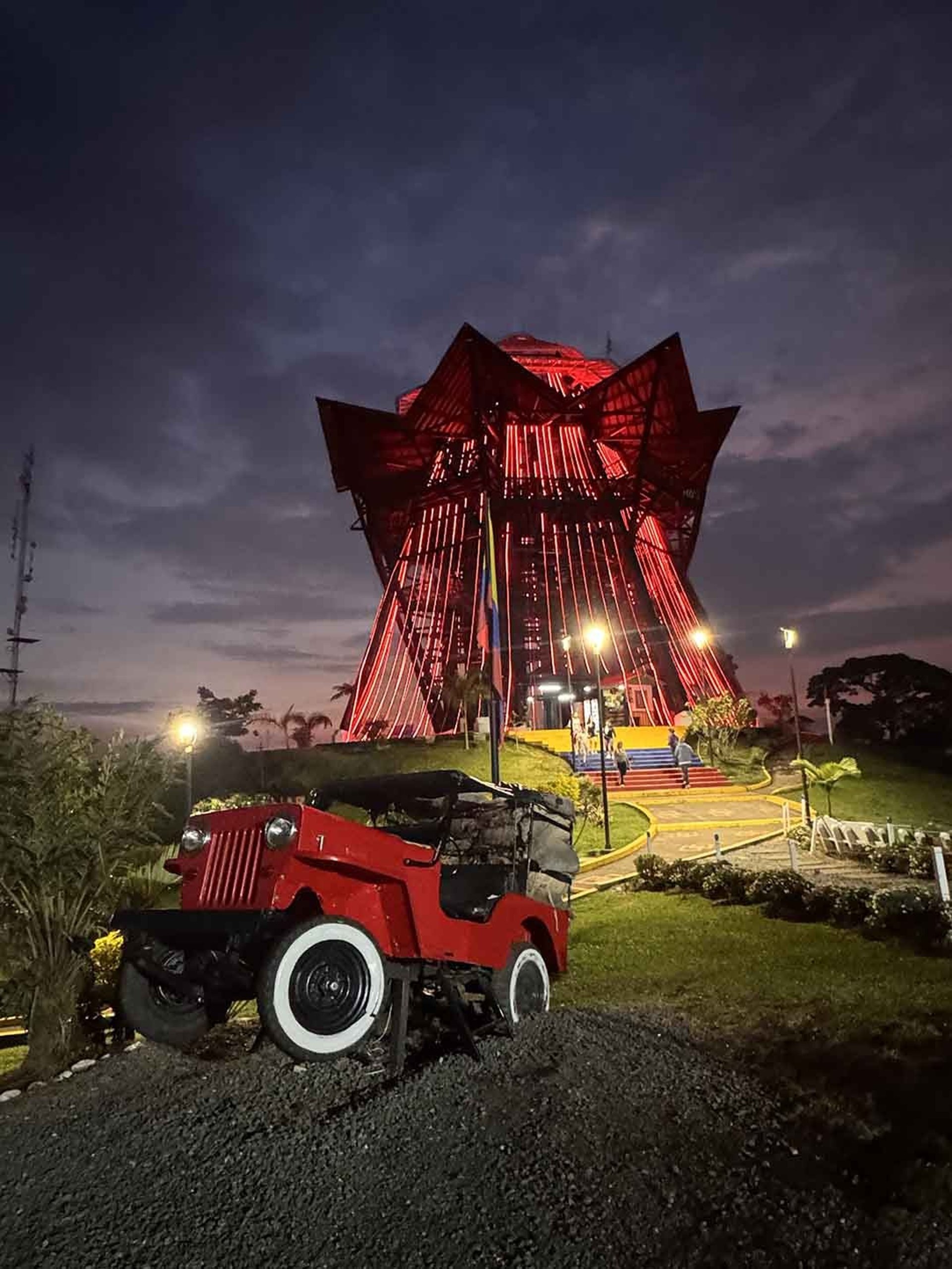 woman wearing yellow long-sleeved dress under white clouds and blue sky during daytime