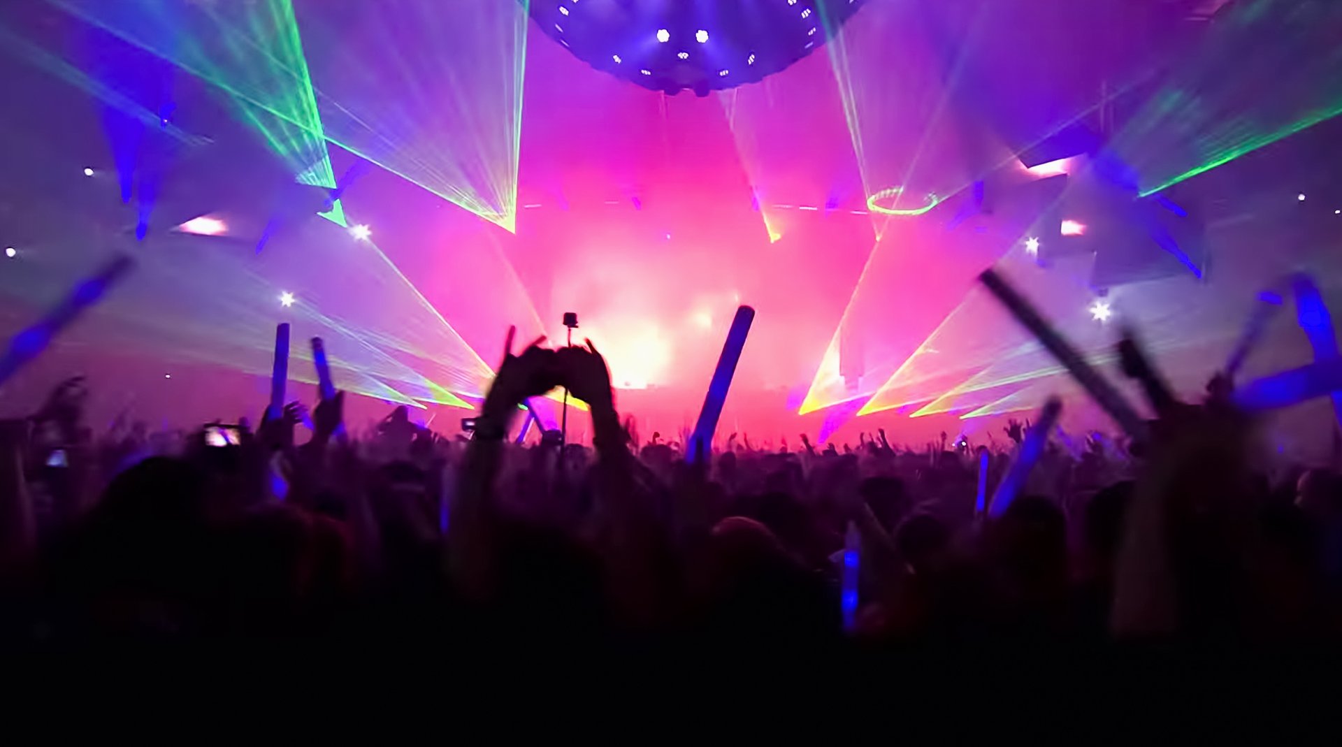 an abstract photo of a curved building with a blue sky in the background