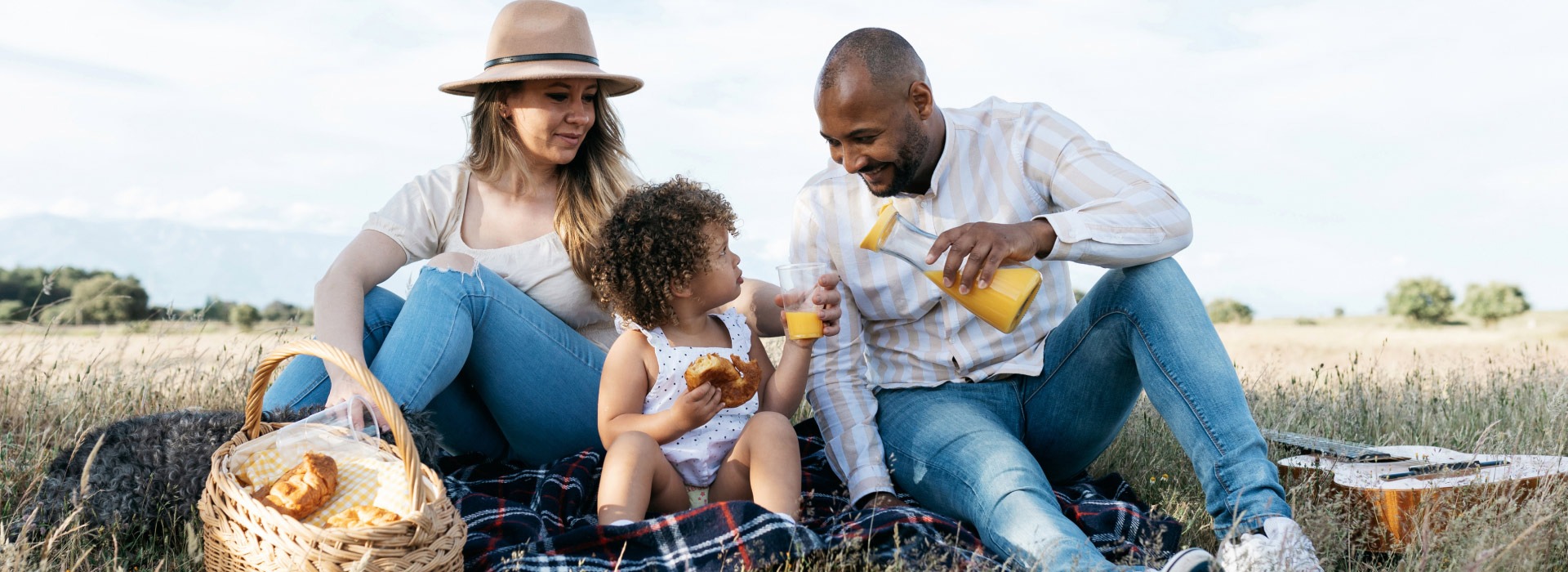 an abstract photo of a curved building with a blue sky in the background