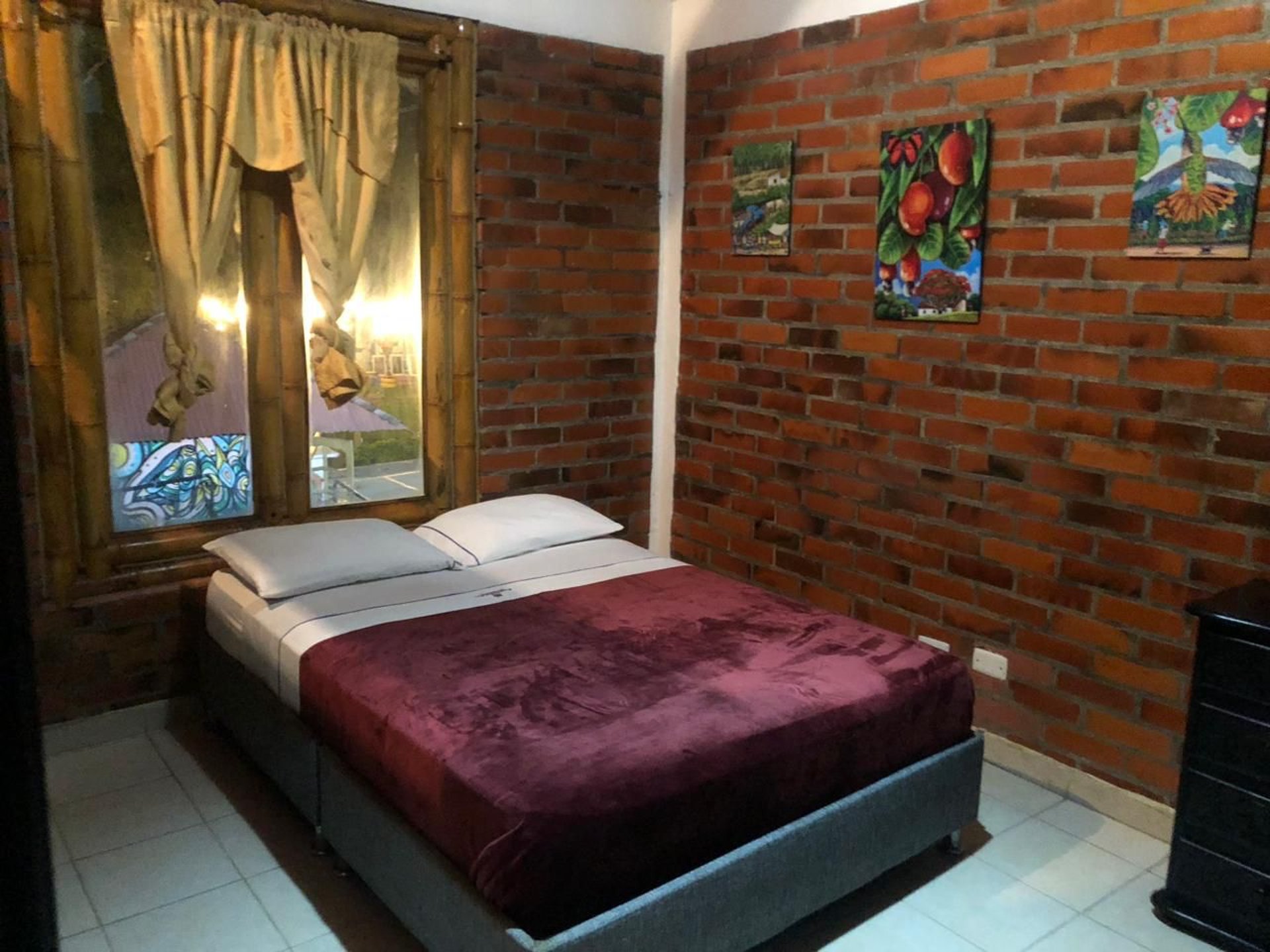 an abstract photo of a curved building with a blue sky in the background