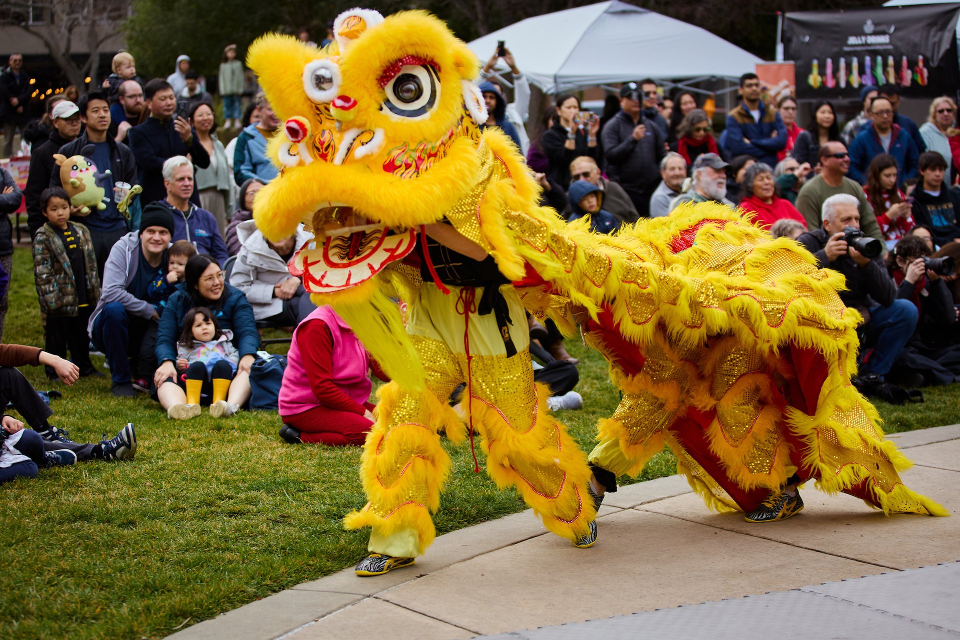 an abstract photo of a curved building with a blue sky in the background