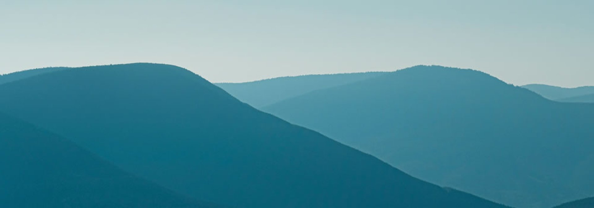 landscape photography of green mountain