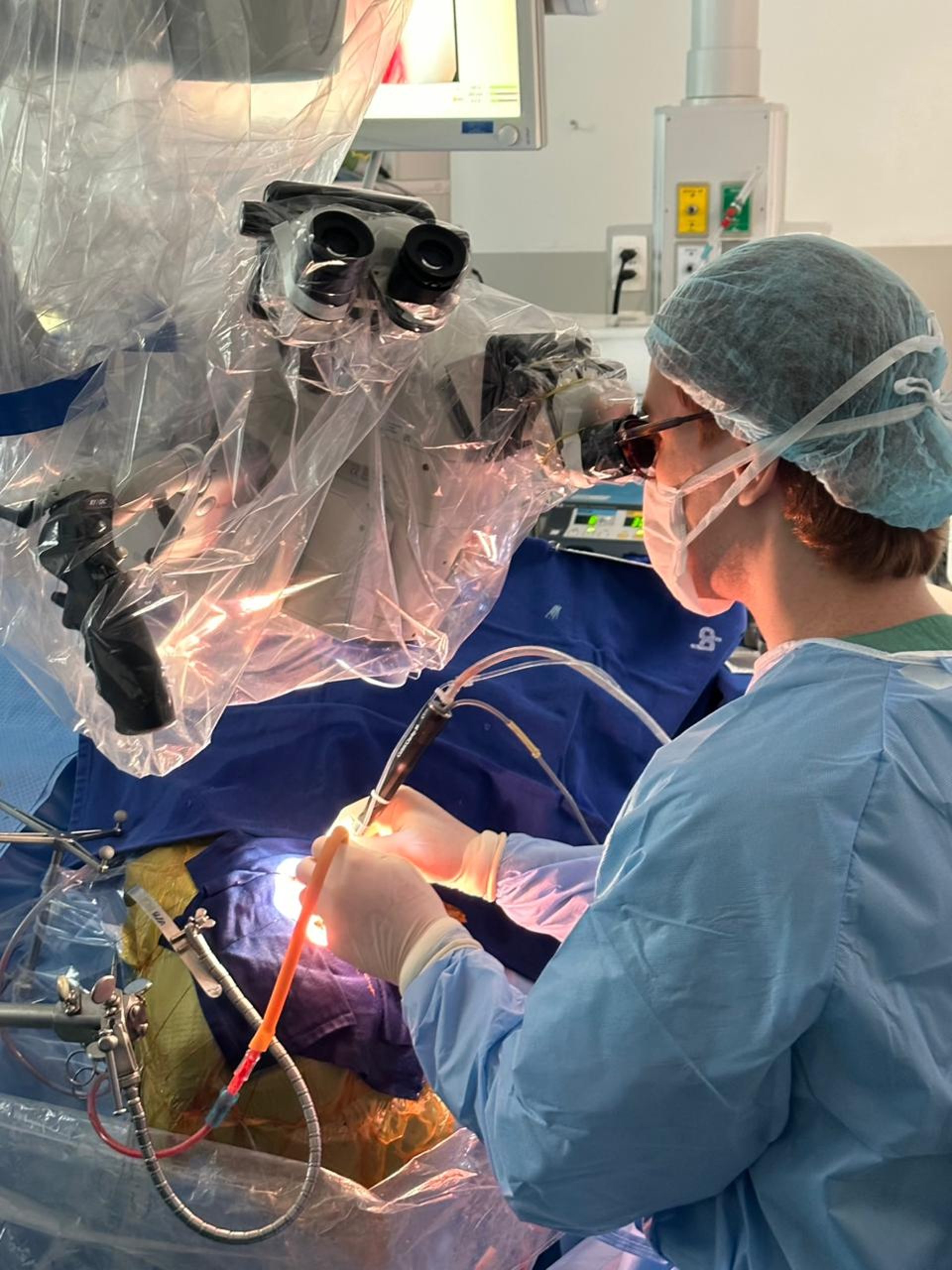 an abstract photo of a curved building with a blue sky in the background