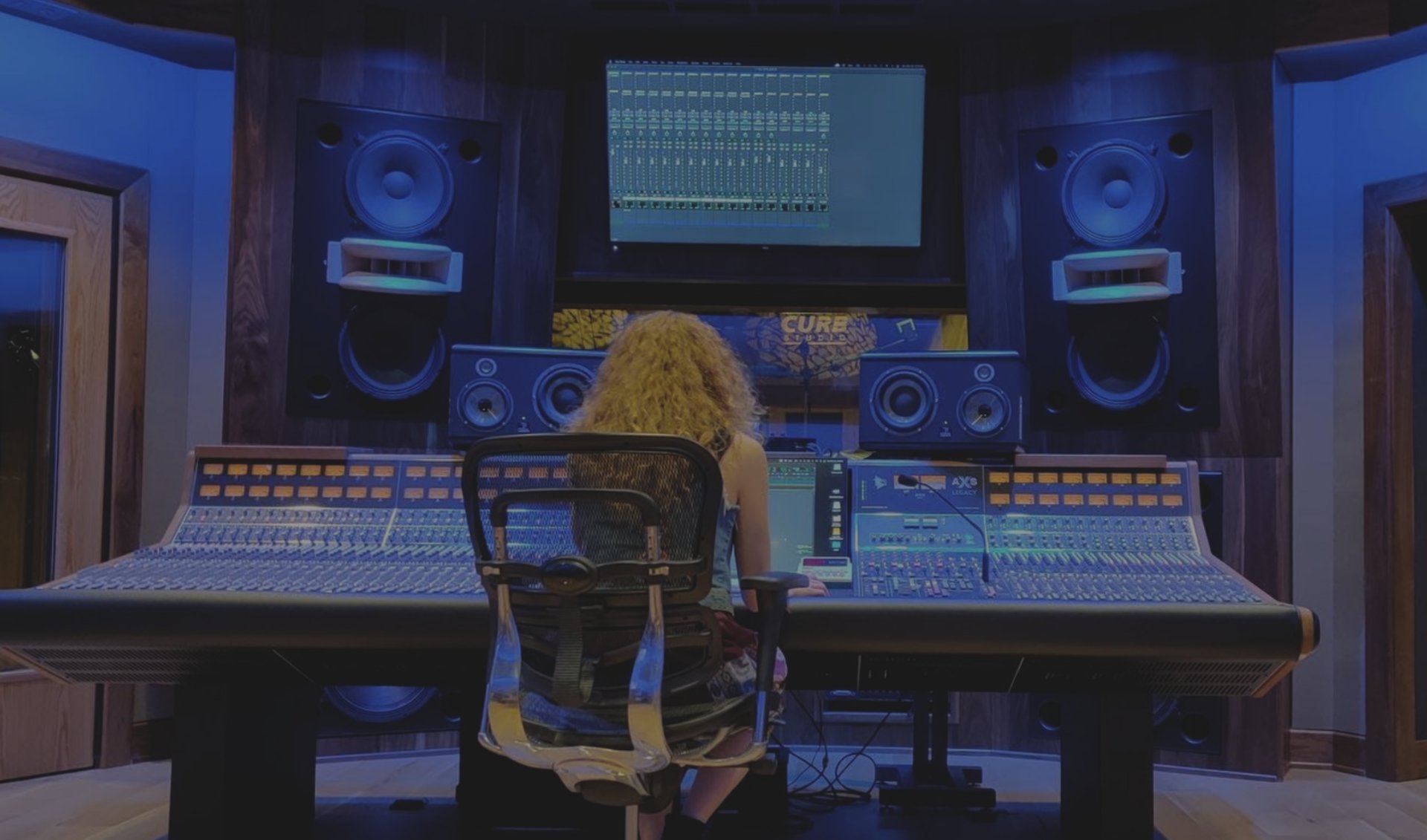 black and brown leather padded tub sofa