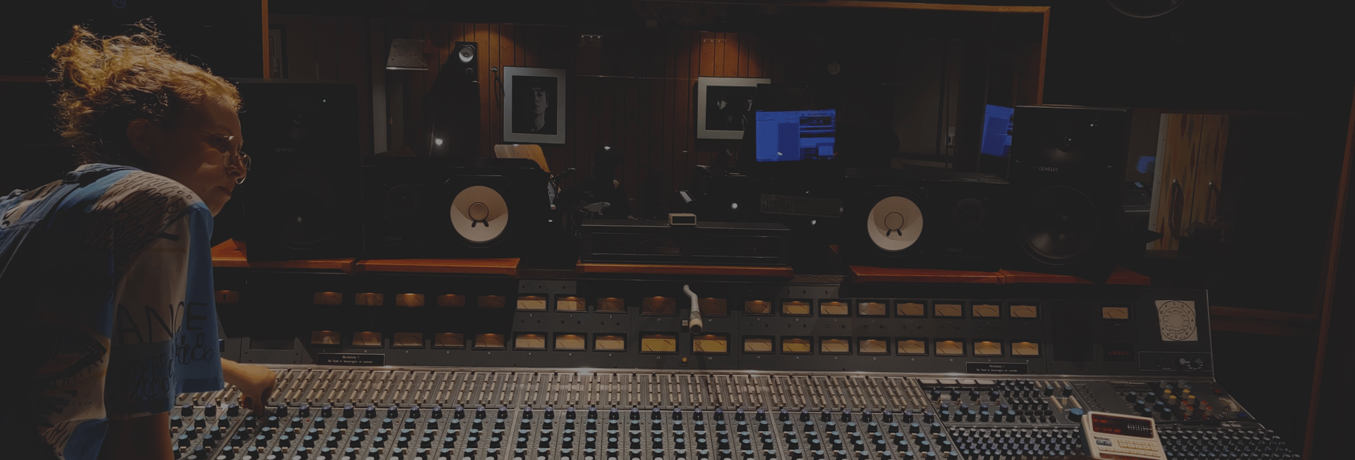 an abstract photo of a curved building with a blue sky in the background