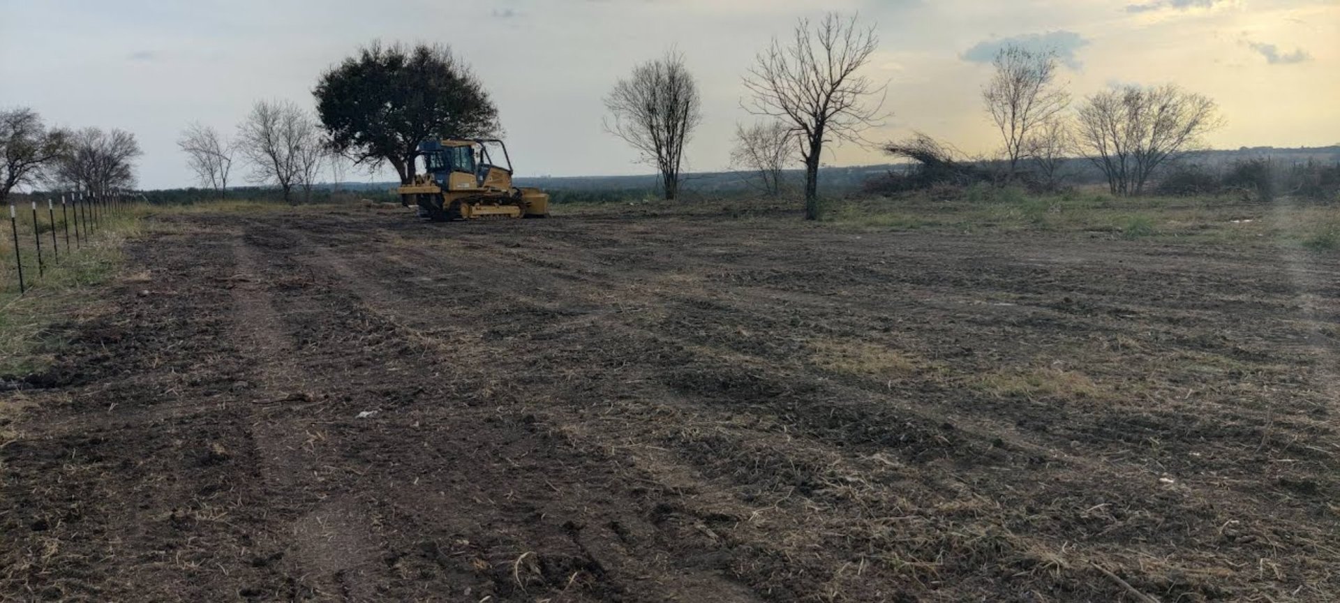 yellow and black heavy equipment on snow covered ground during daytime