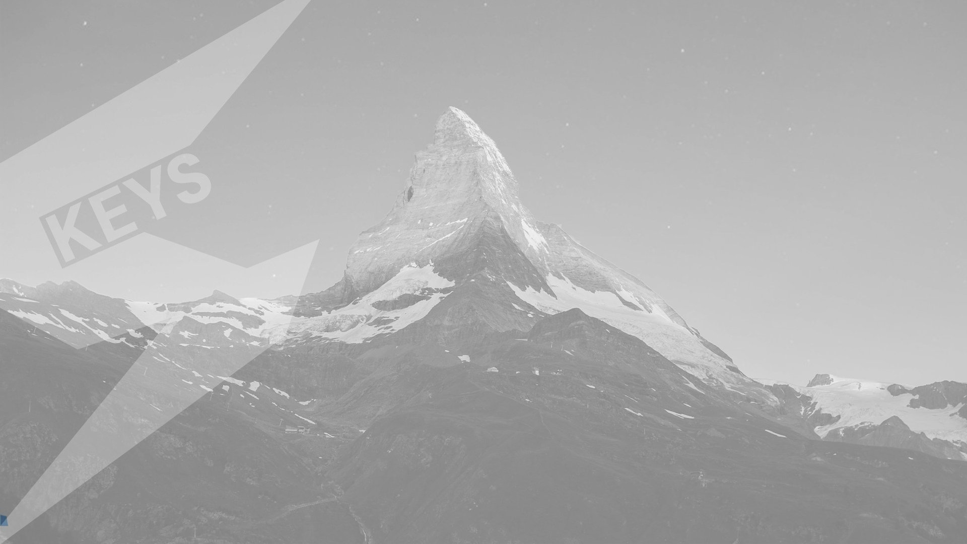 mountain covered by snow under blue sky