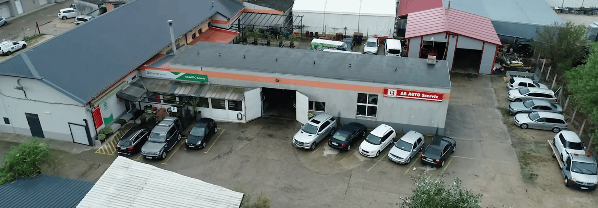 an abstract photo of a curved building with a blue sky in the background