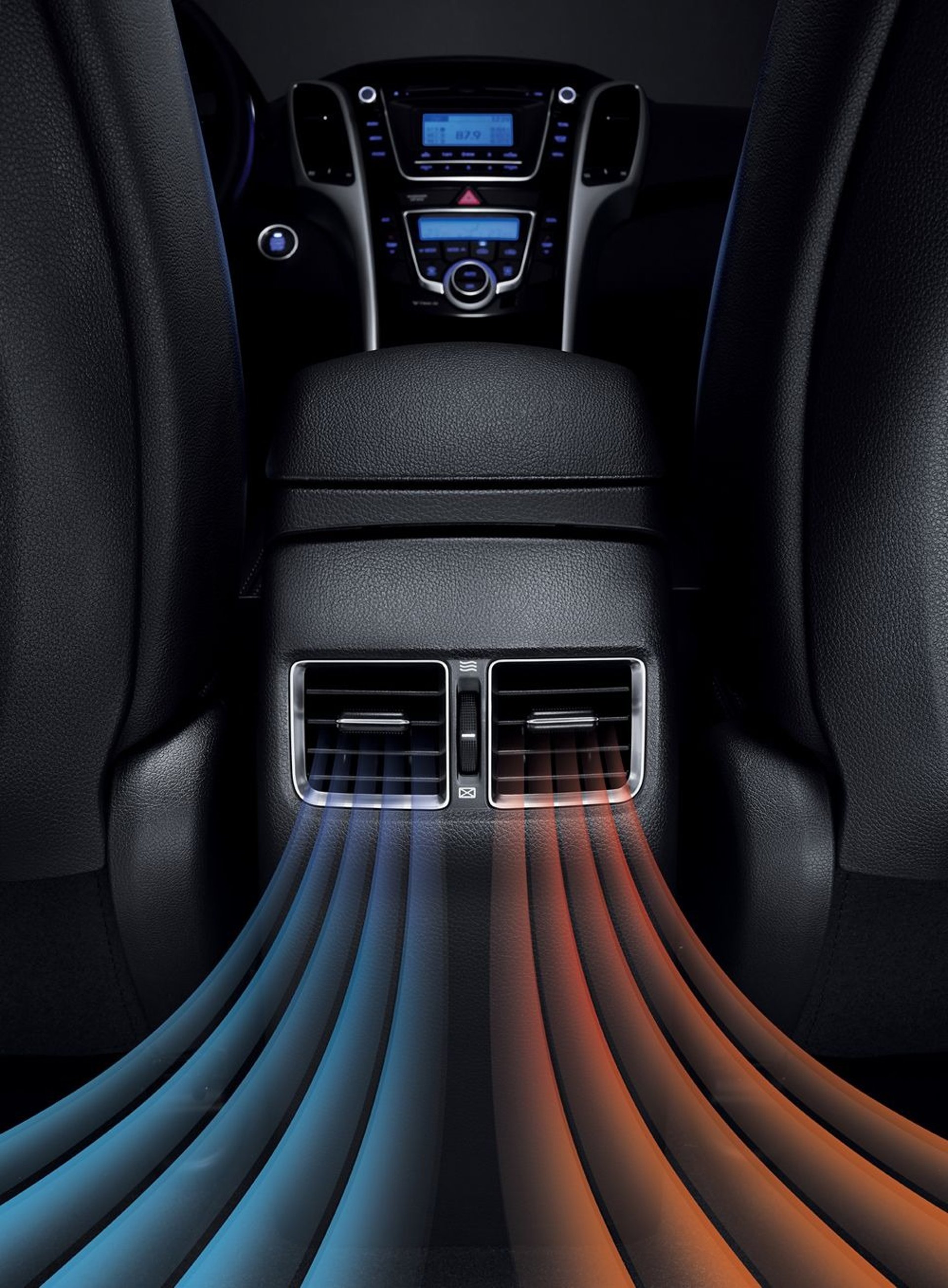 an abstract photo of a curved building with a blue sky in the background