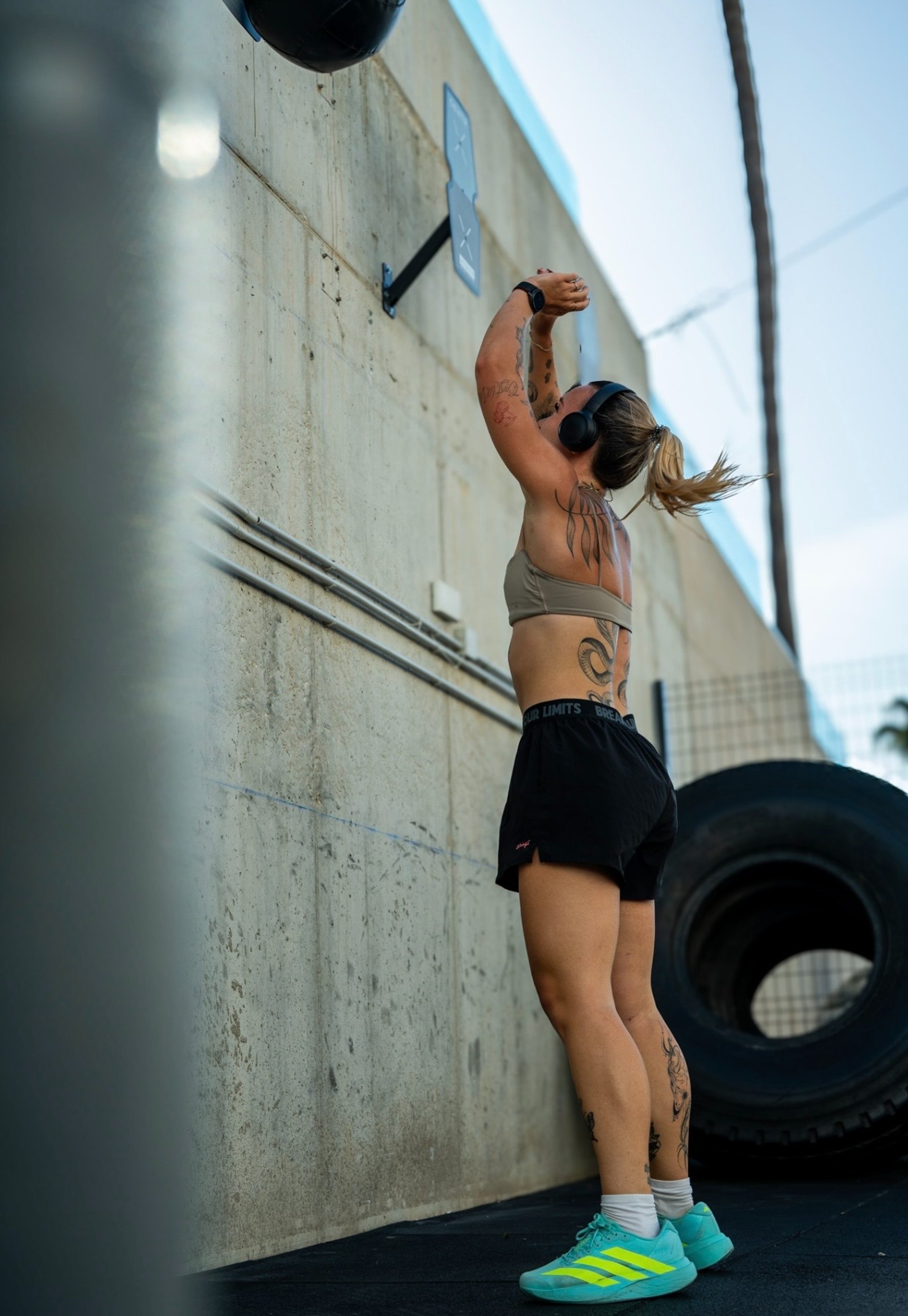 woman in black sports bra