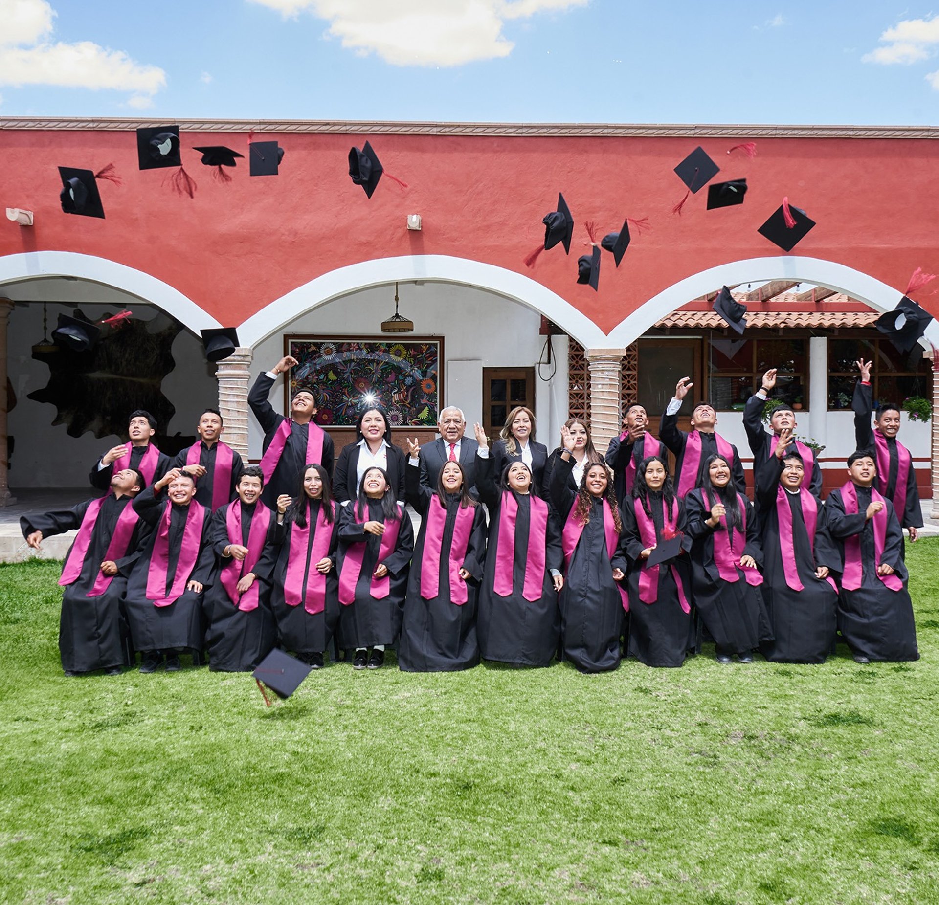 an abstract photo of a curved building with a blue sky in the background