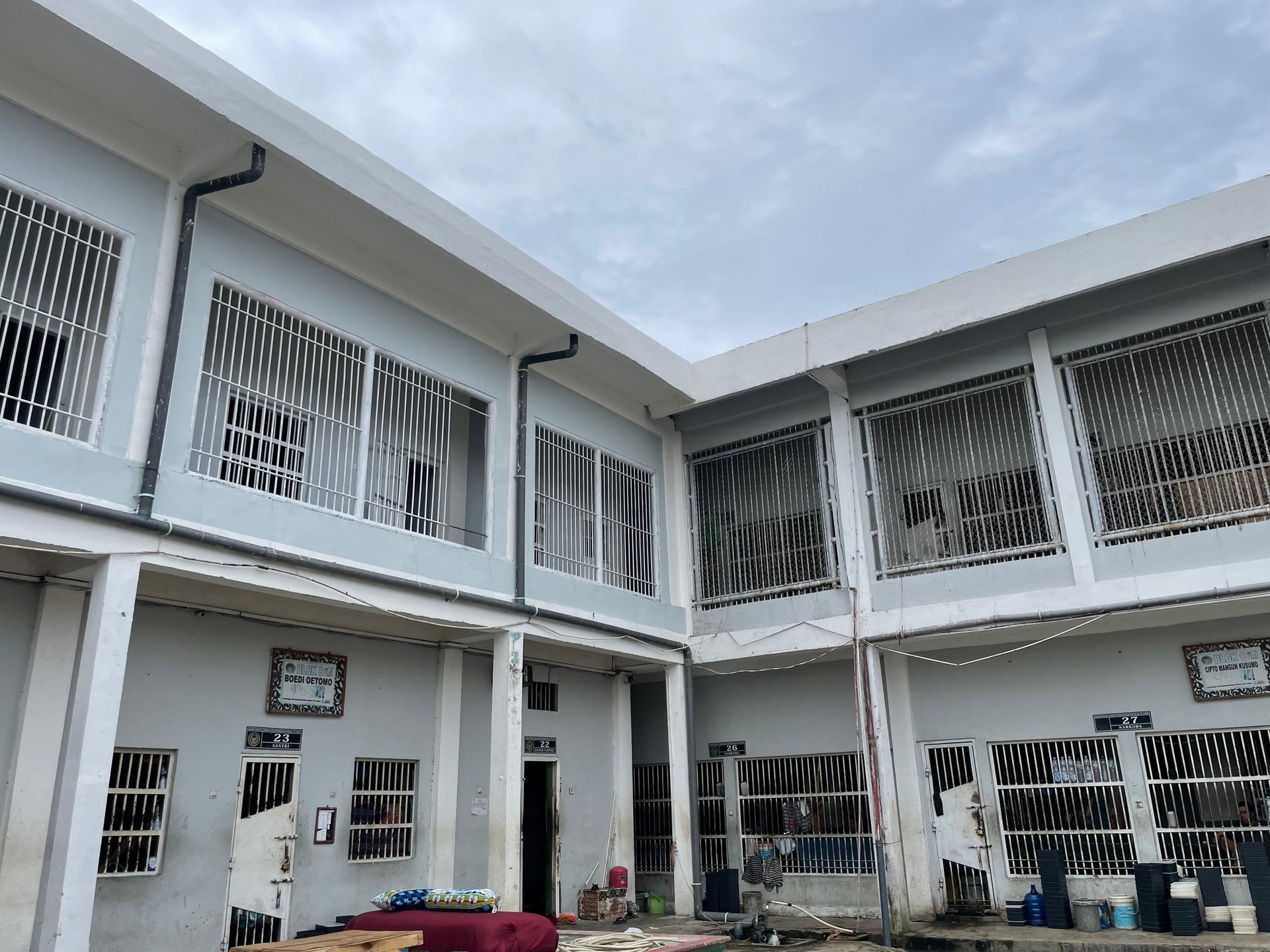 A cozy restaurant table with a lamp is shown.