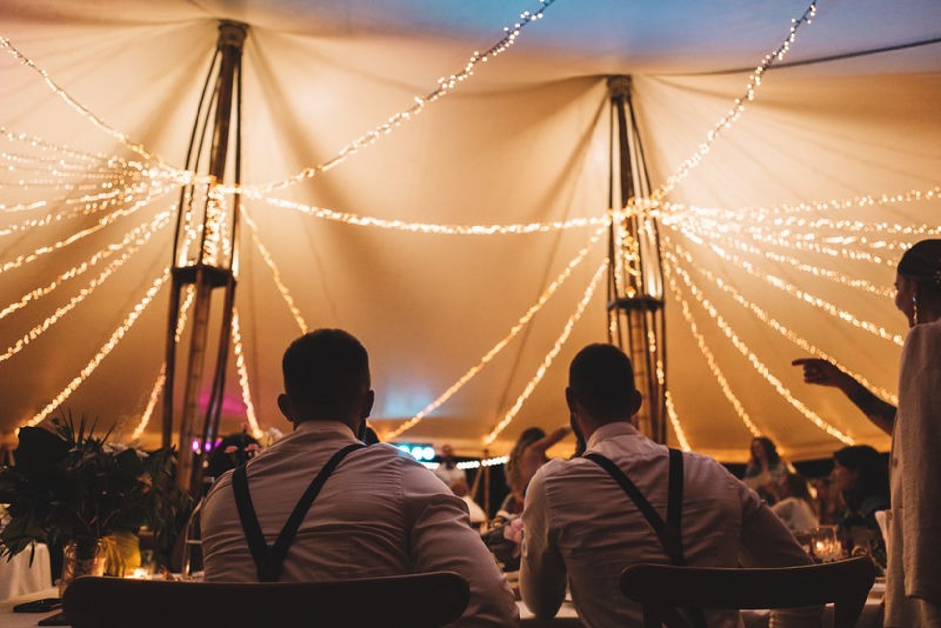 an abstract photo of a curved building with a blue sky in the background