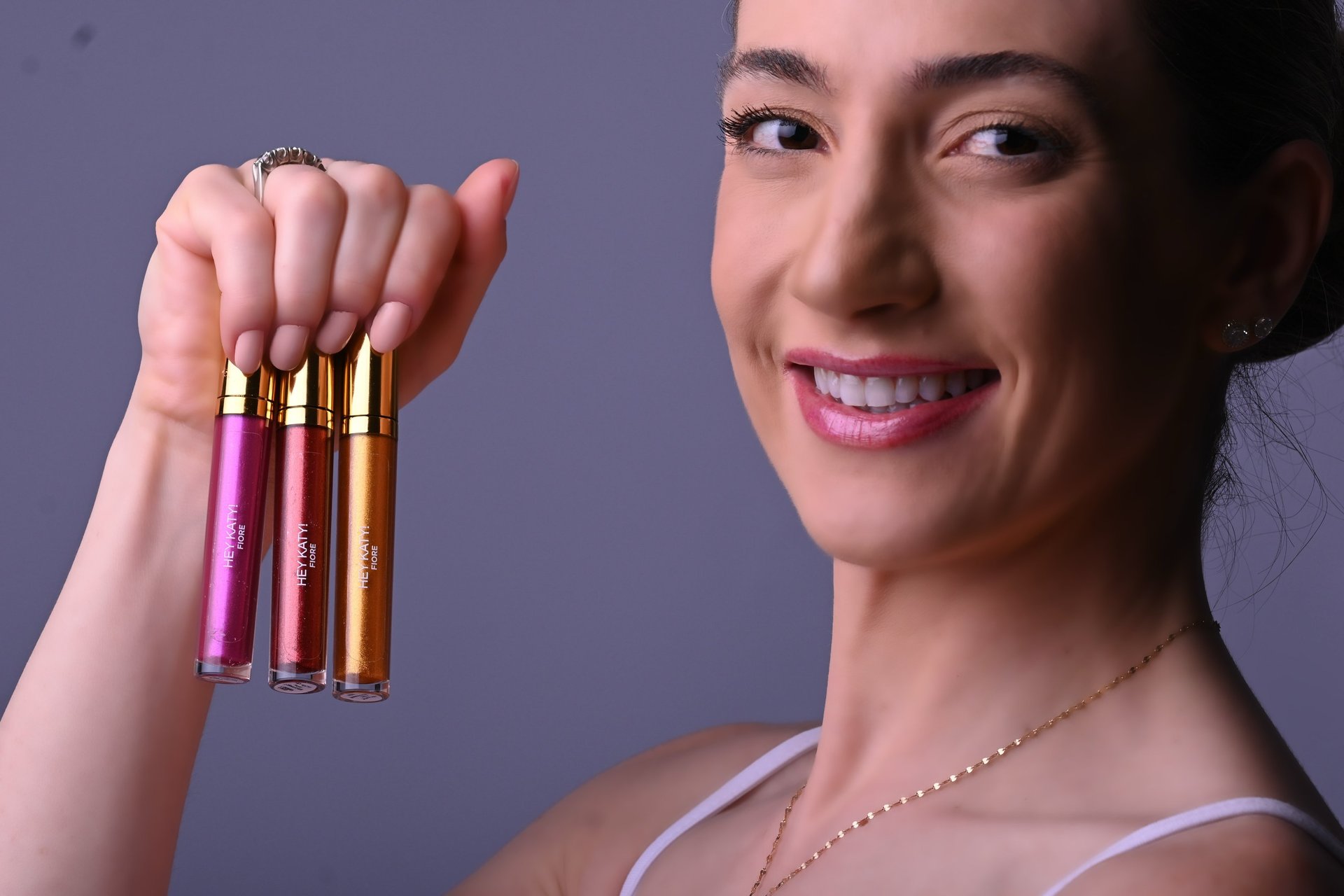 person wearing grey knit sweater