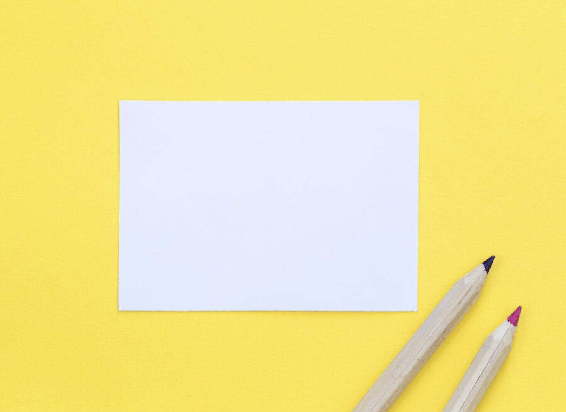 white printer paper on white and black polka dot textile