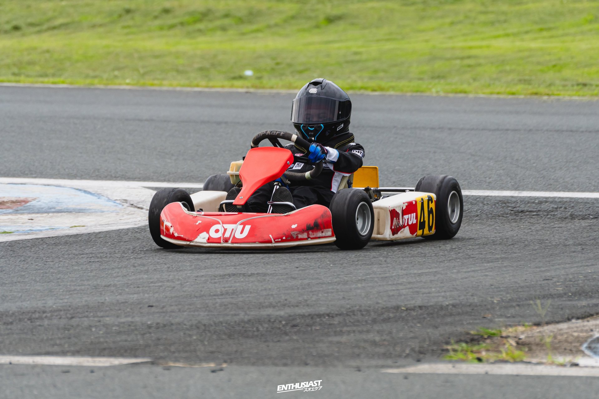 a close up of a black and brown abstract painting