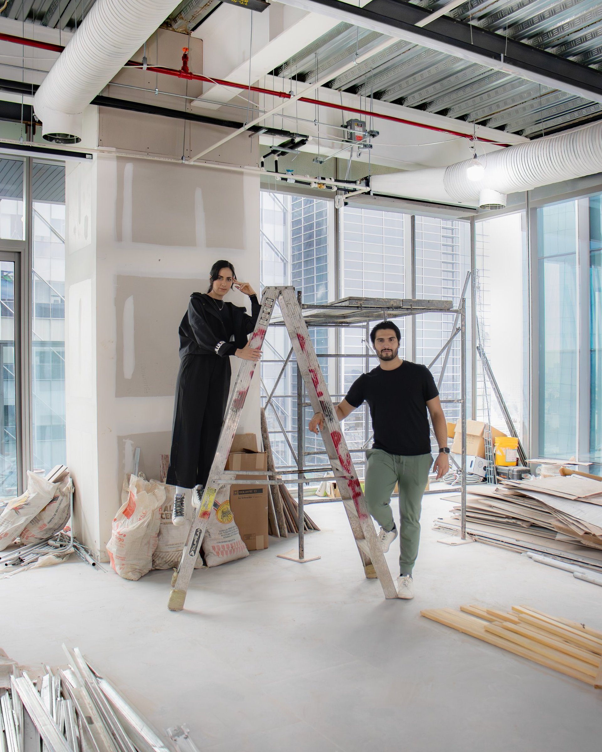 an abstract photo of a curved building with a blue sky in the background