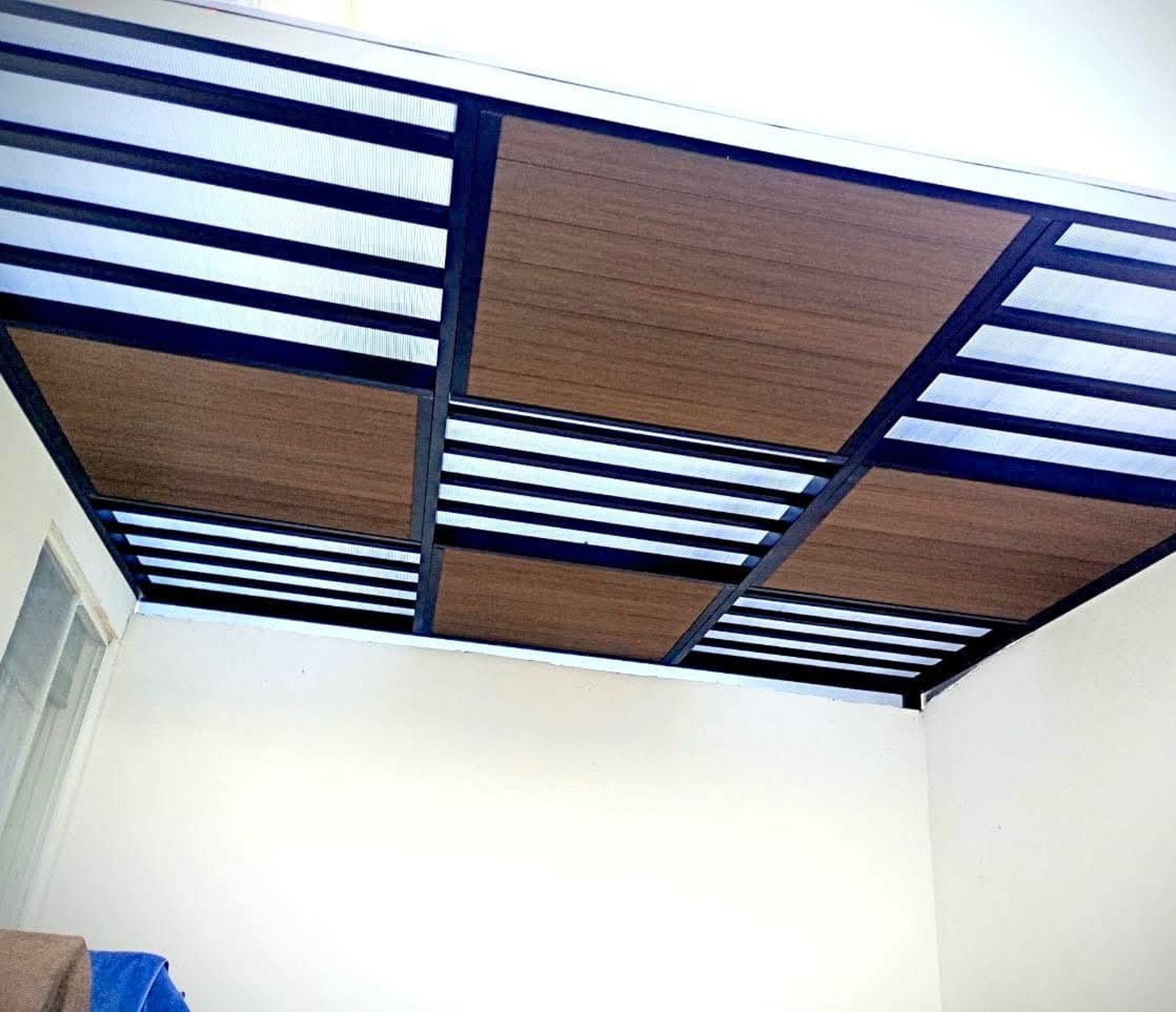 black and brown leather padded tub sofa