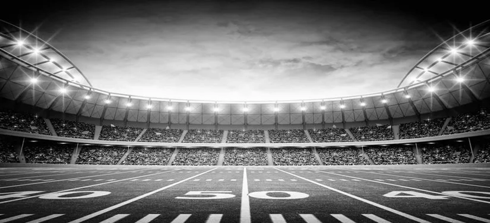 an abstract photo of a curved building with a blue sky in the background