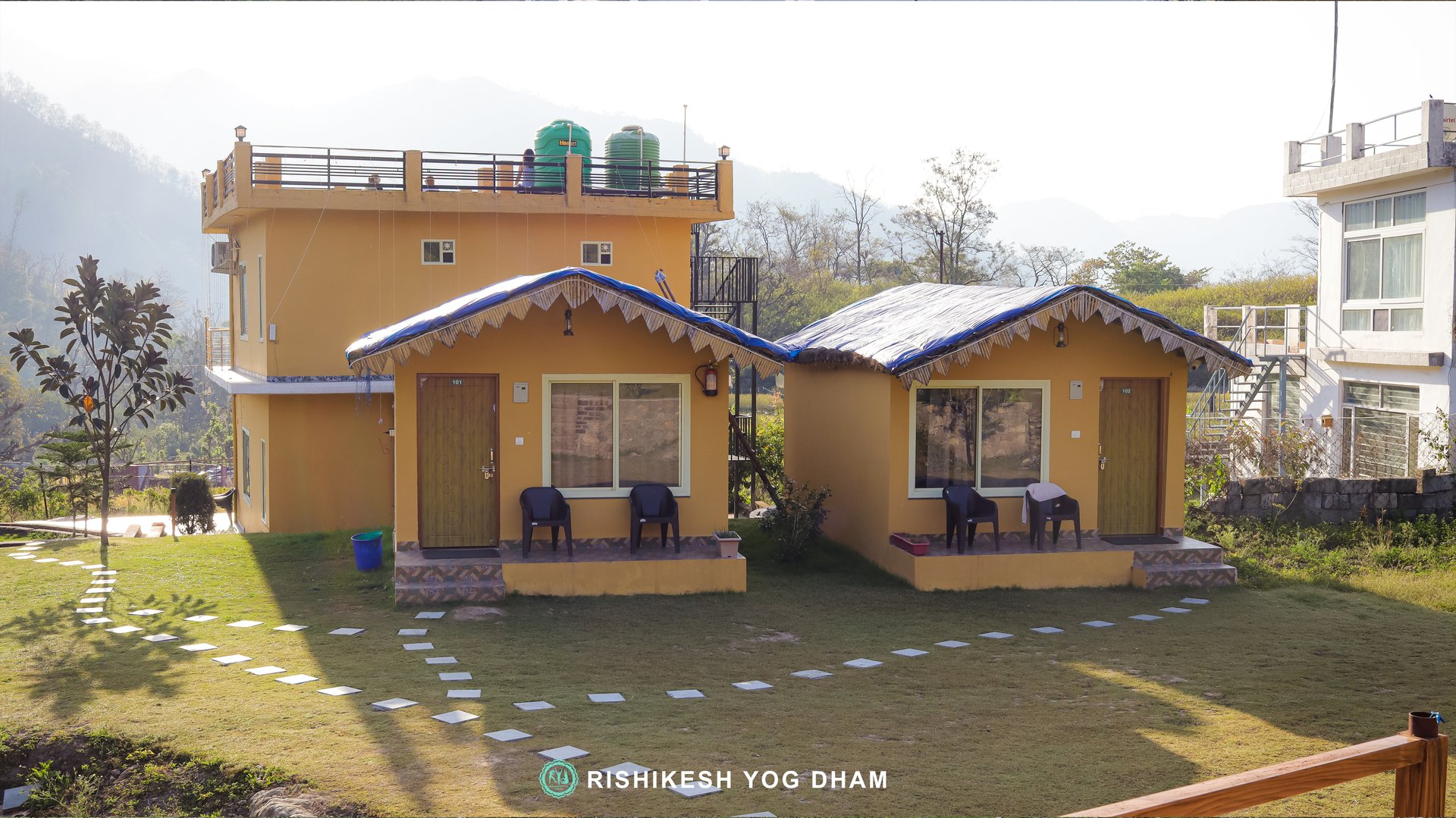 woman wearing yellow long-sleeved dress under white clouds and blue sky during daytime